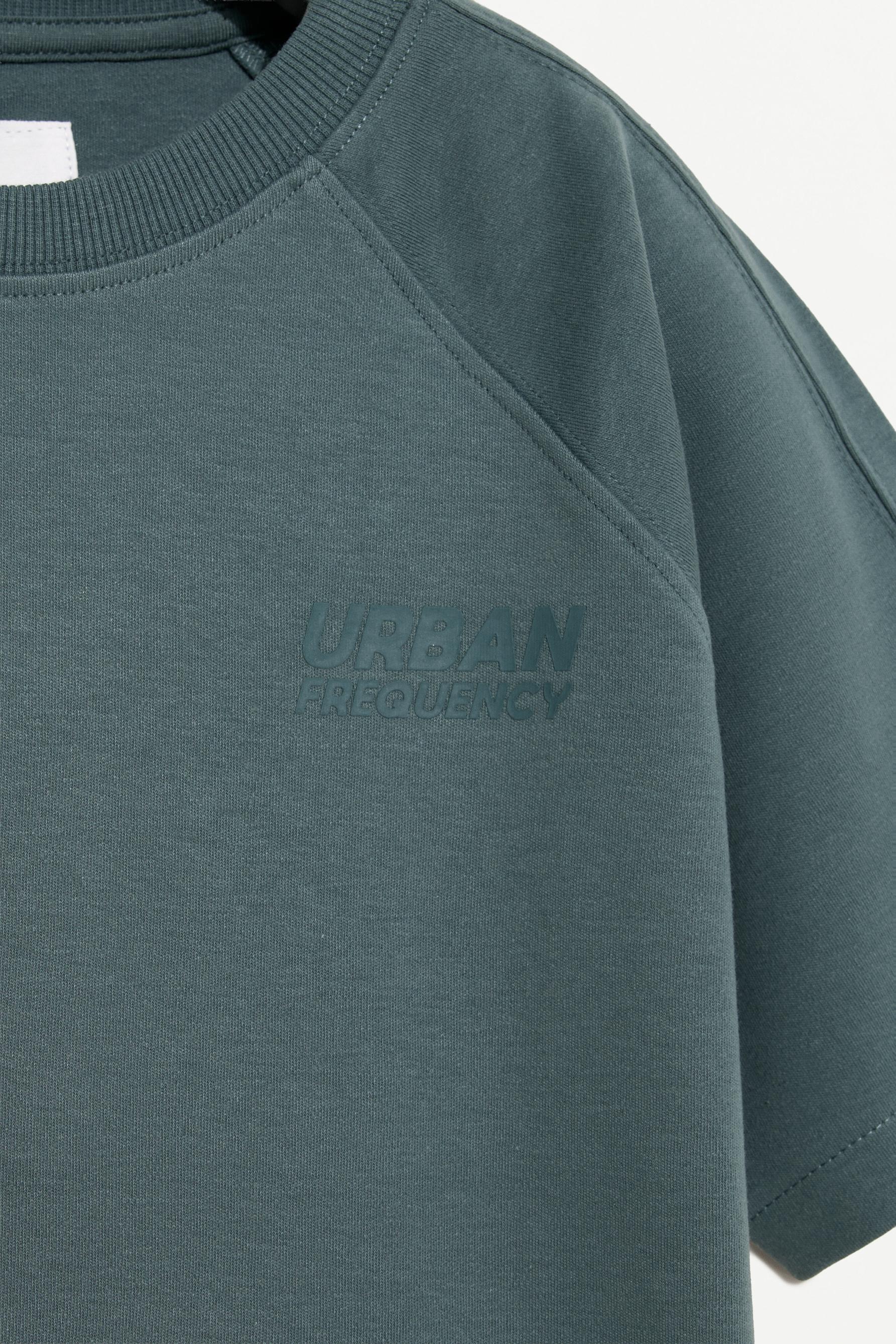 Interlock T-shirt with rubberised slogan