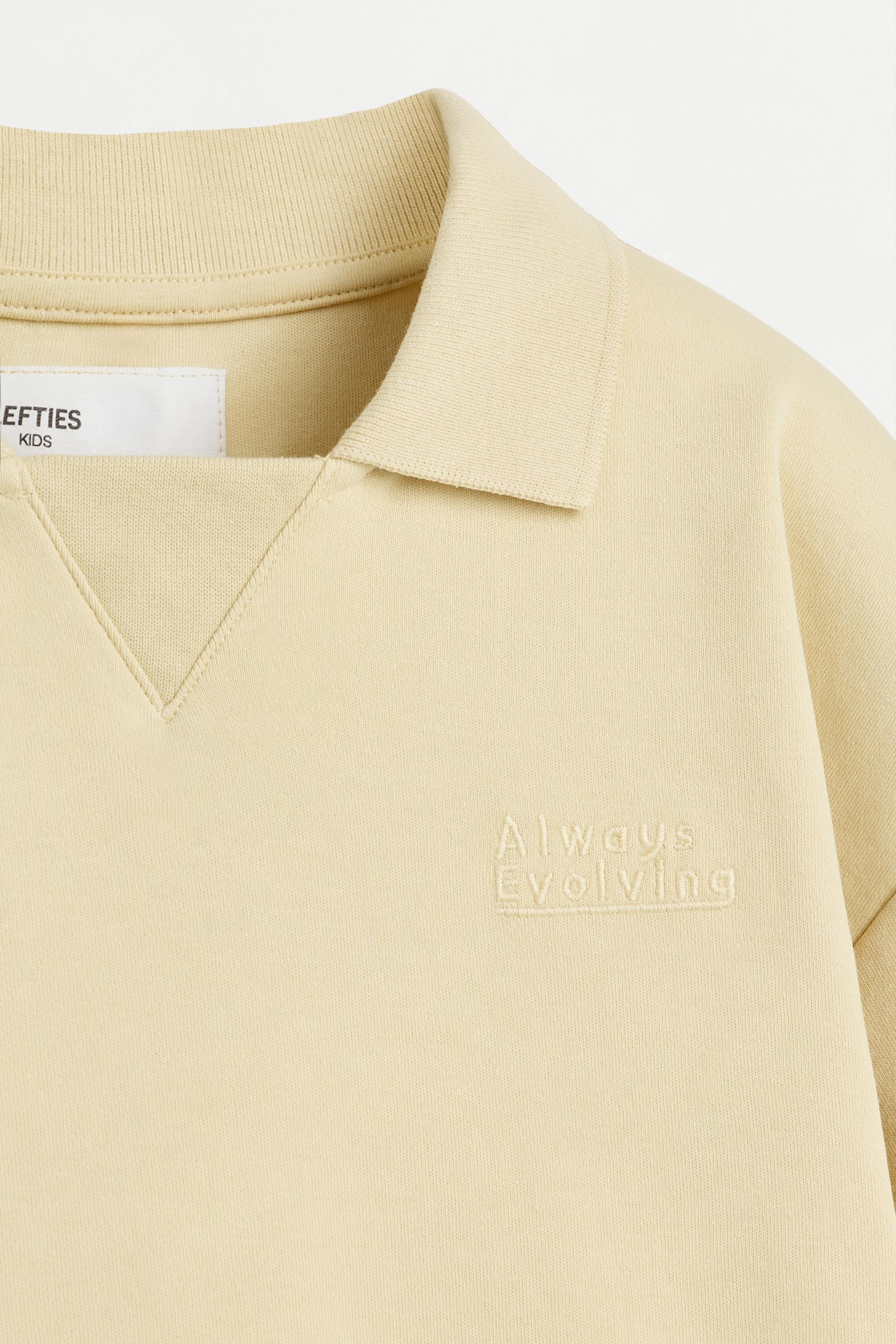 Interlock polo shirt with text