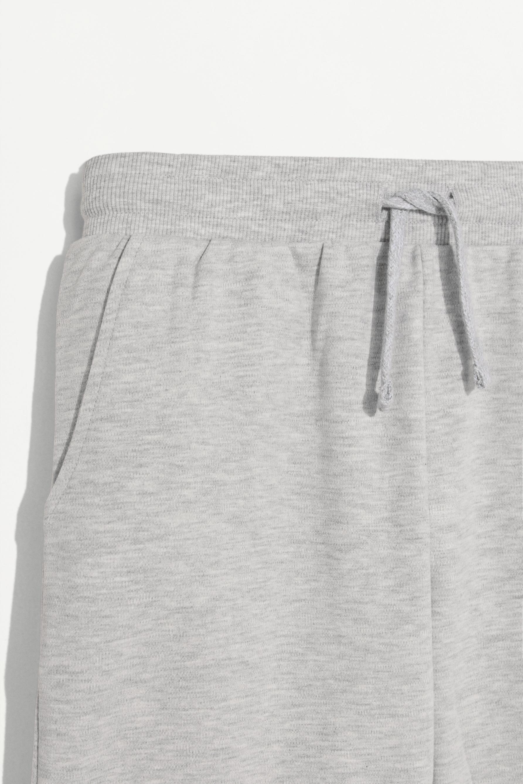 Interlock Bermuda shorts with rubberised text