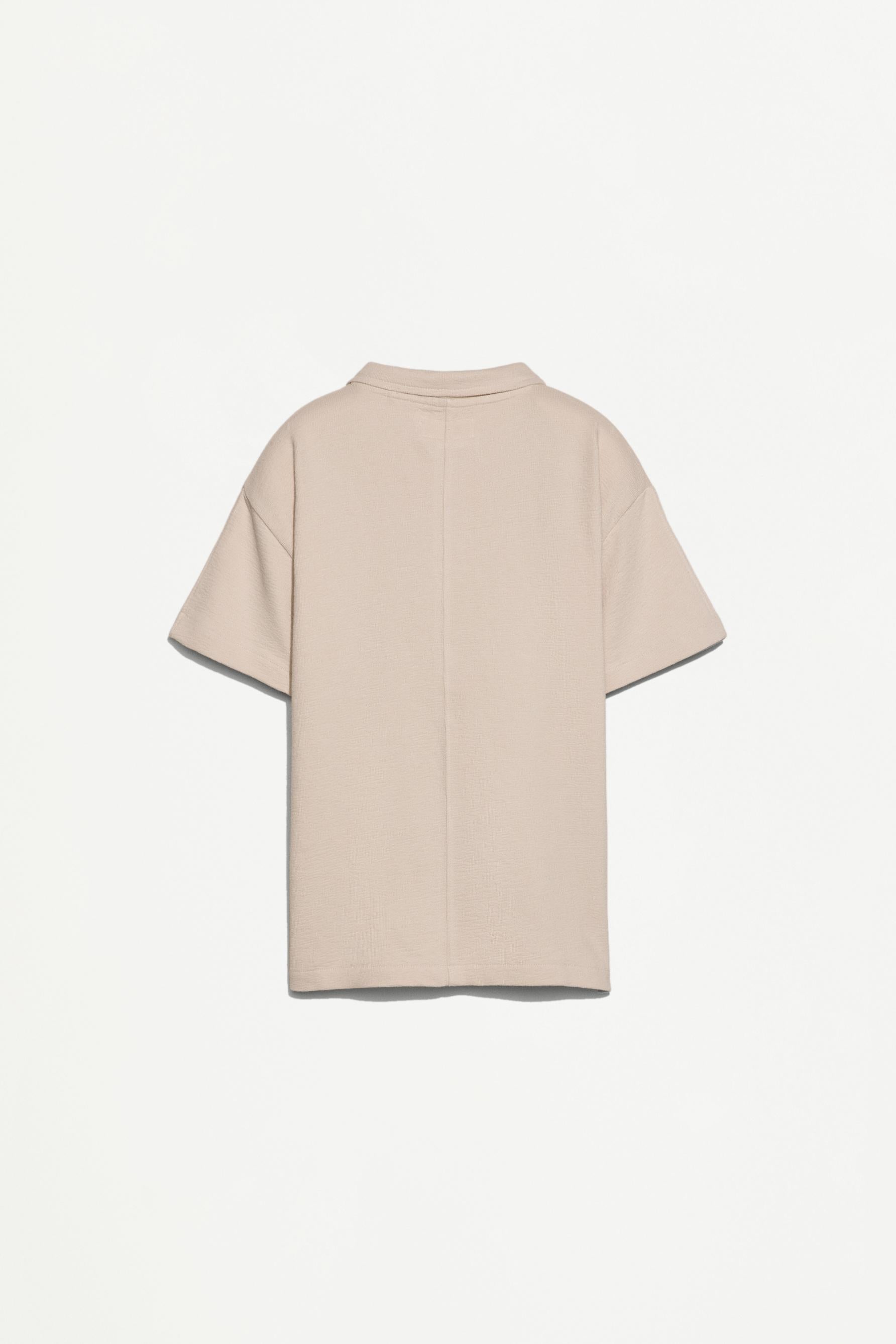 Bias cut polo shirt