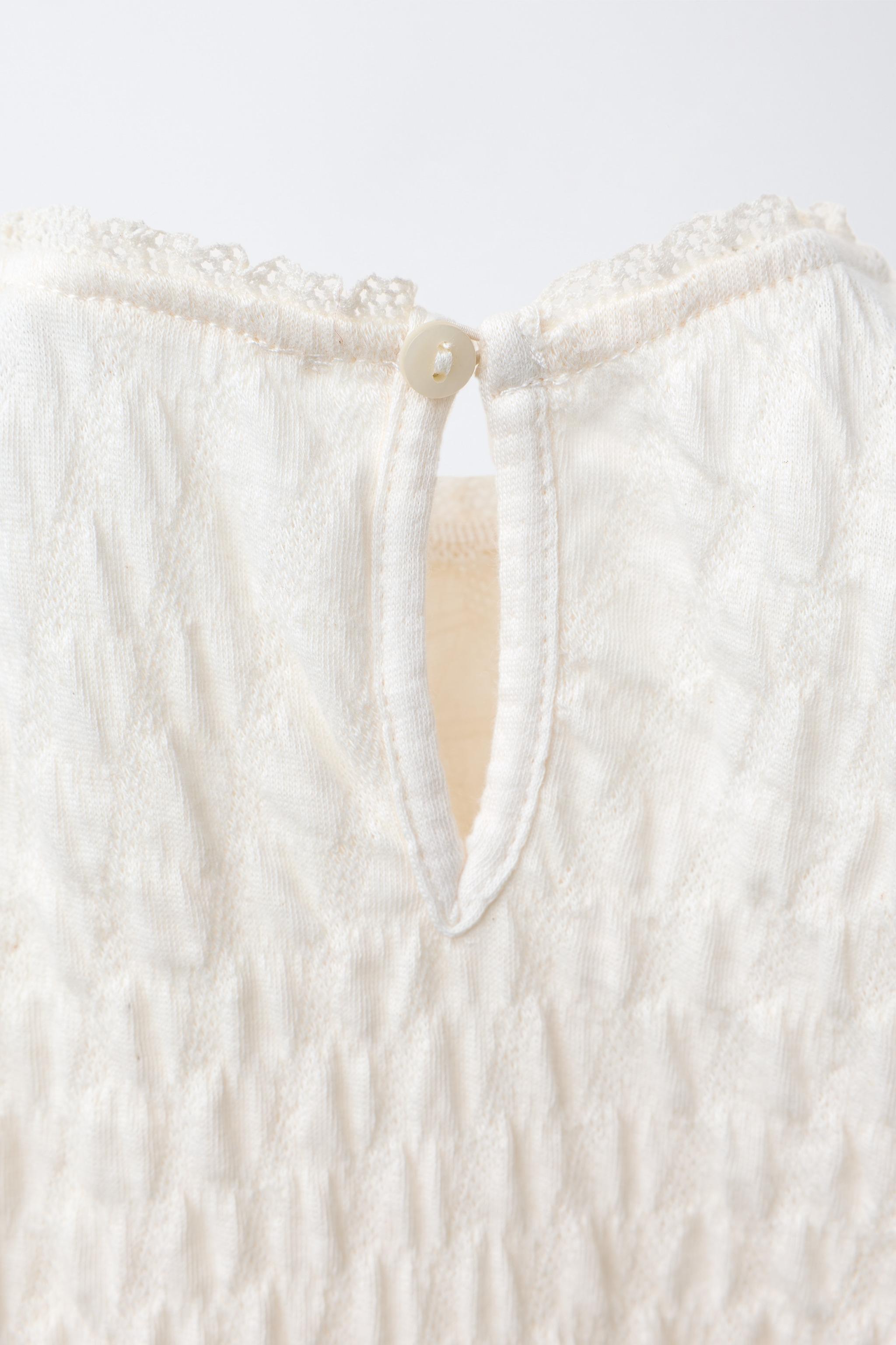 TEXTURED LACE BODYSUIT