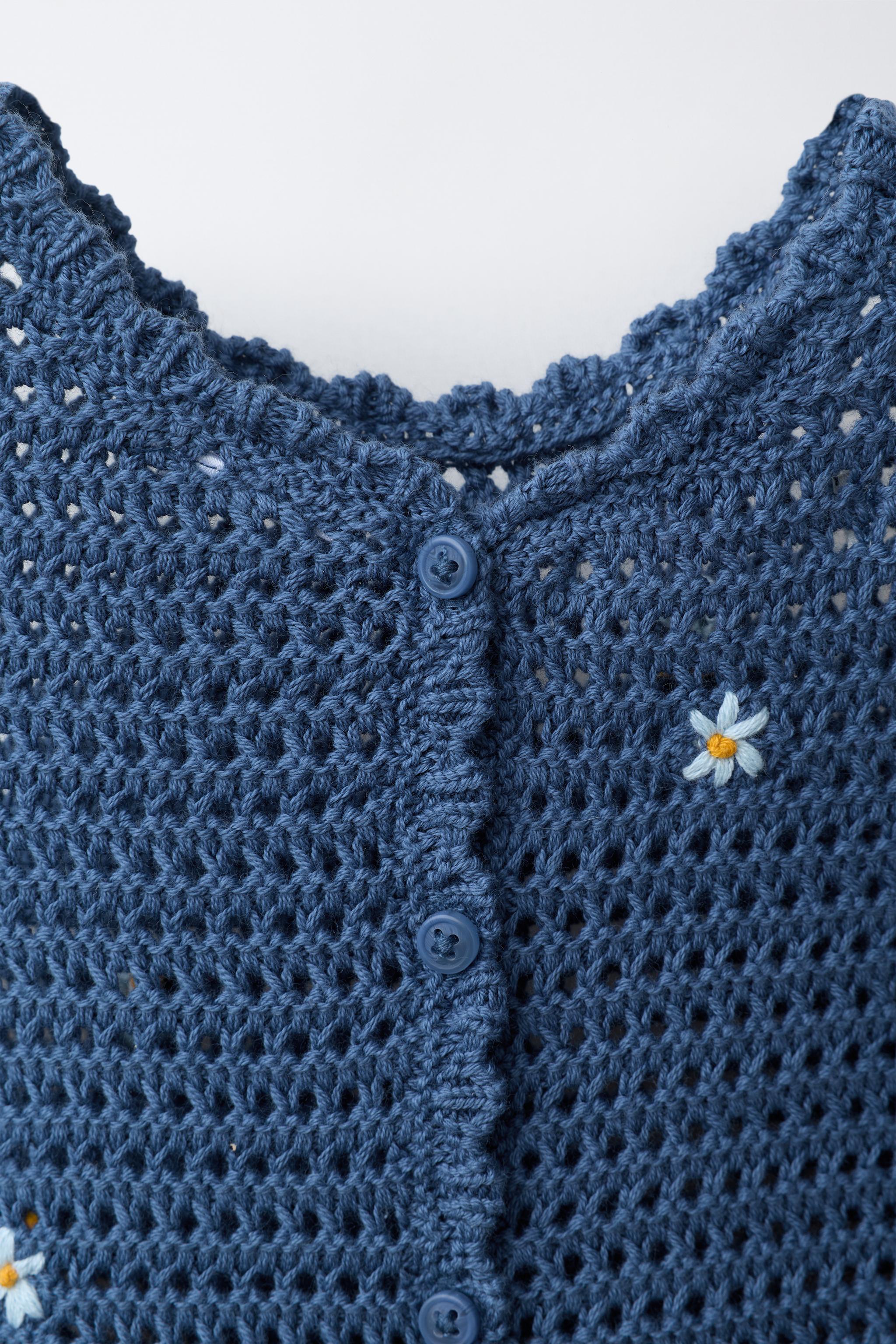 CUTWORK KNIT ROMPER WITH EMBROIDERED FLOWERS