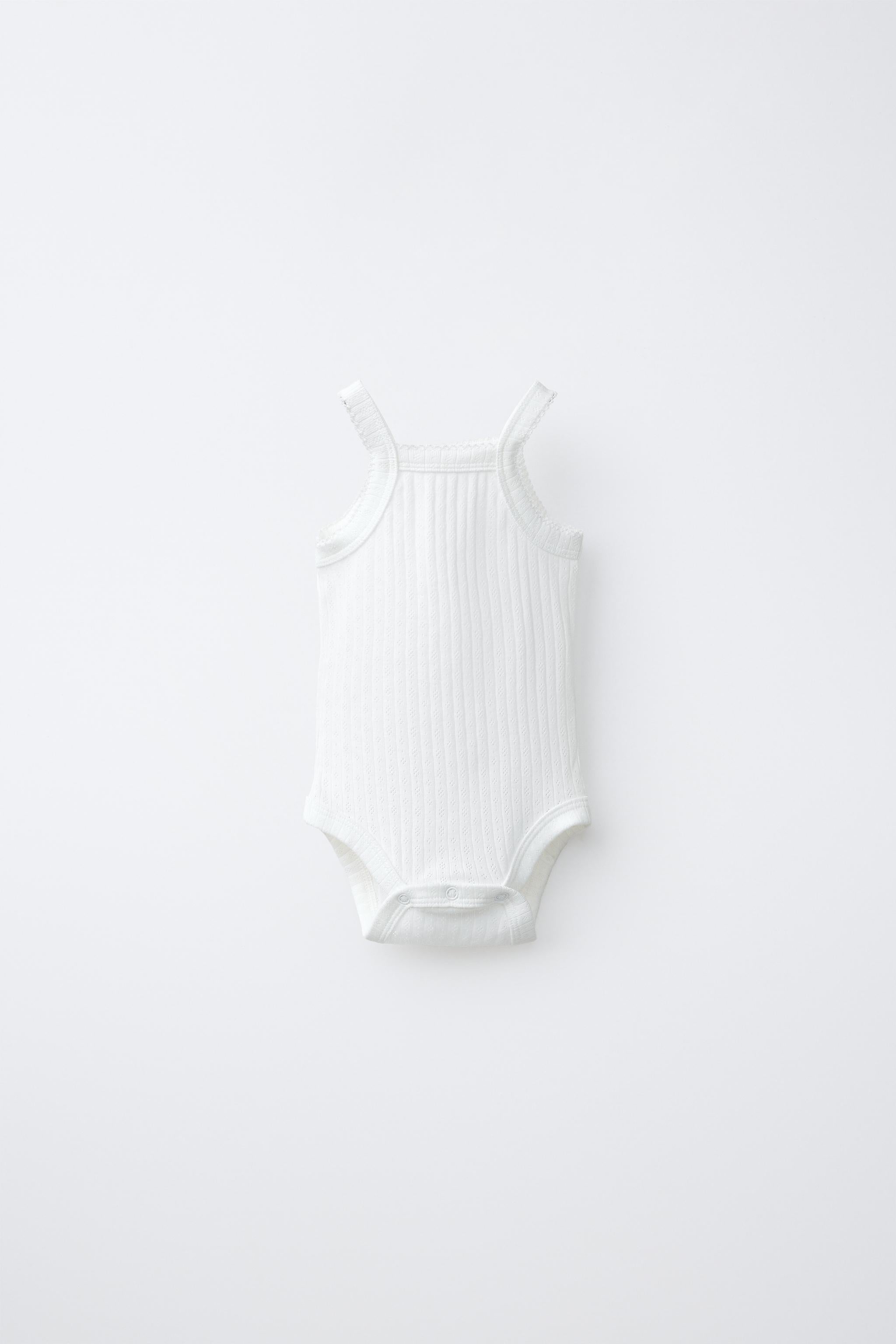3-PACK OF POINTELLE STRAPPY BODYSUITS