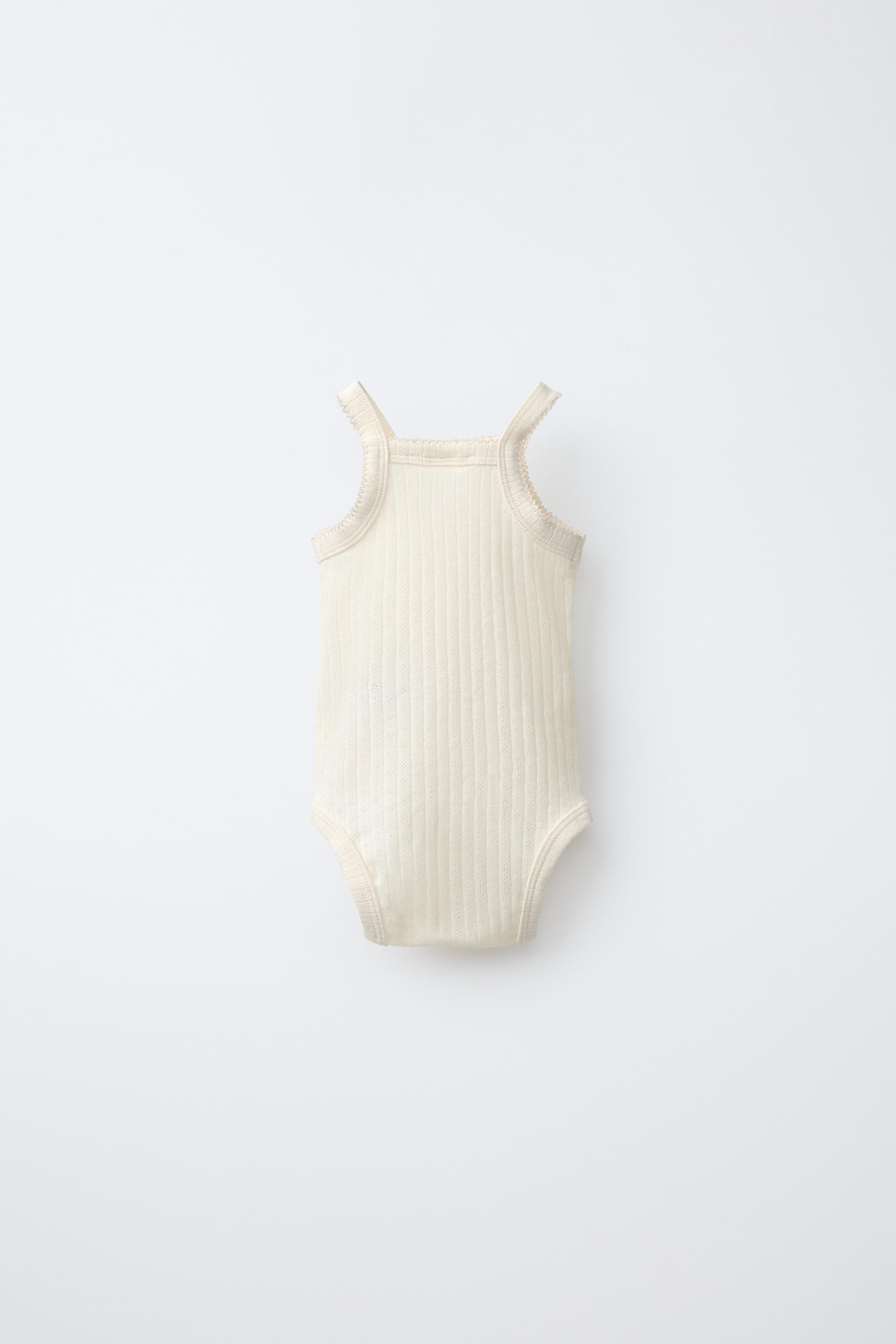 3-PACK OF POINTELLE STRAPPY BODYSUITS