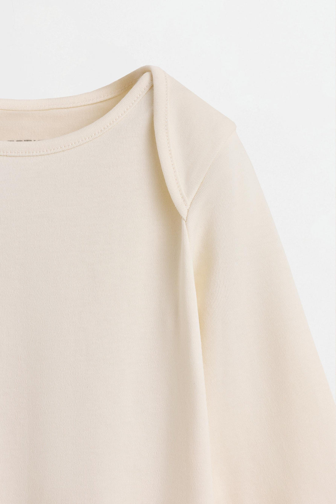 Plain long sleeve bodysuits (4-pack)