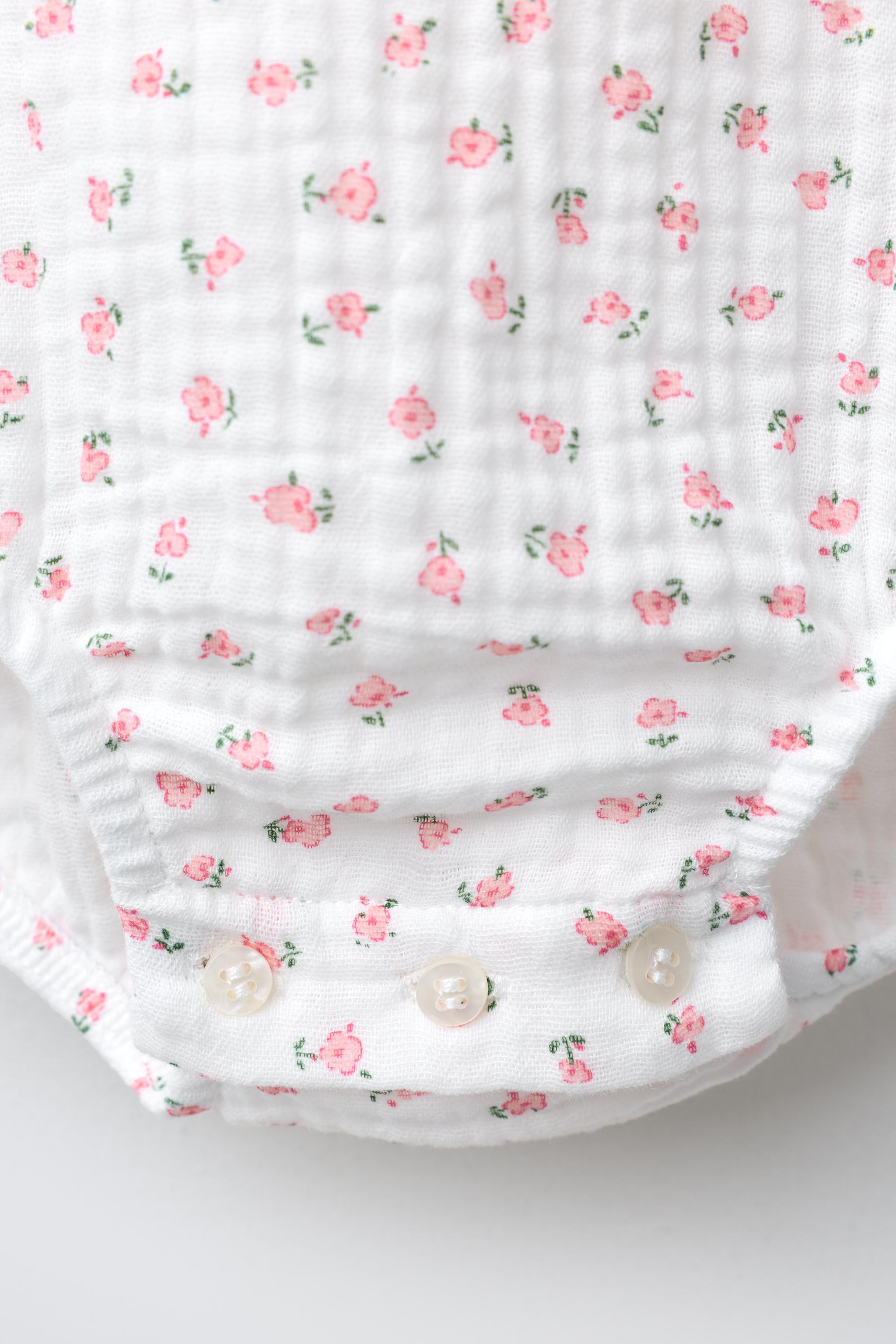 TEXTURED FLORAL BODYSUIT