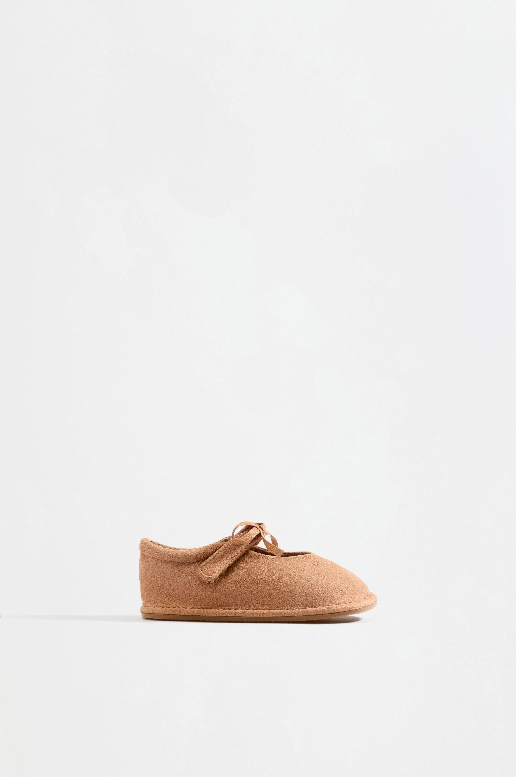 Barefoot bow ballet flats