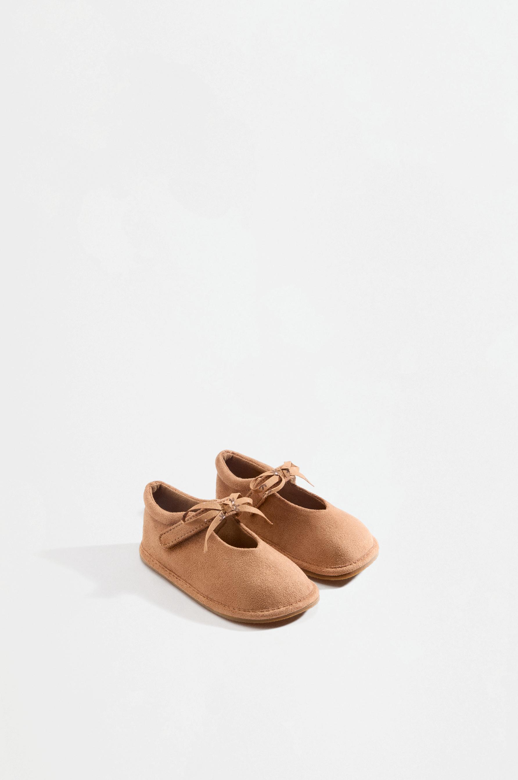 Barefoot bow ballet flats