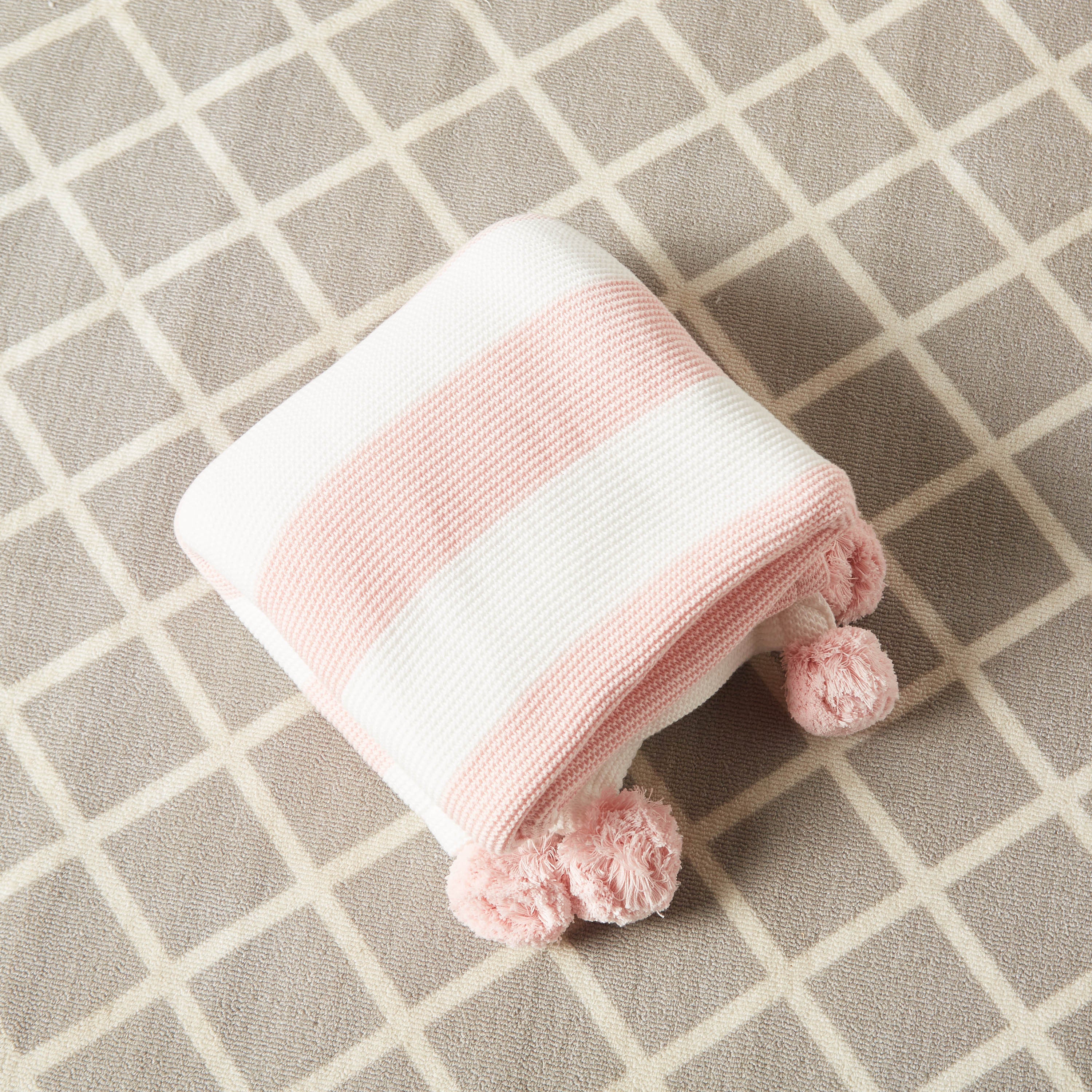 Juniors Striped Knitted Raschel Blanket with Pom Pom Detail - 100x80 cms