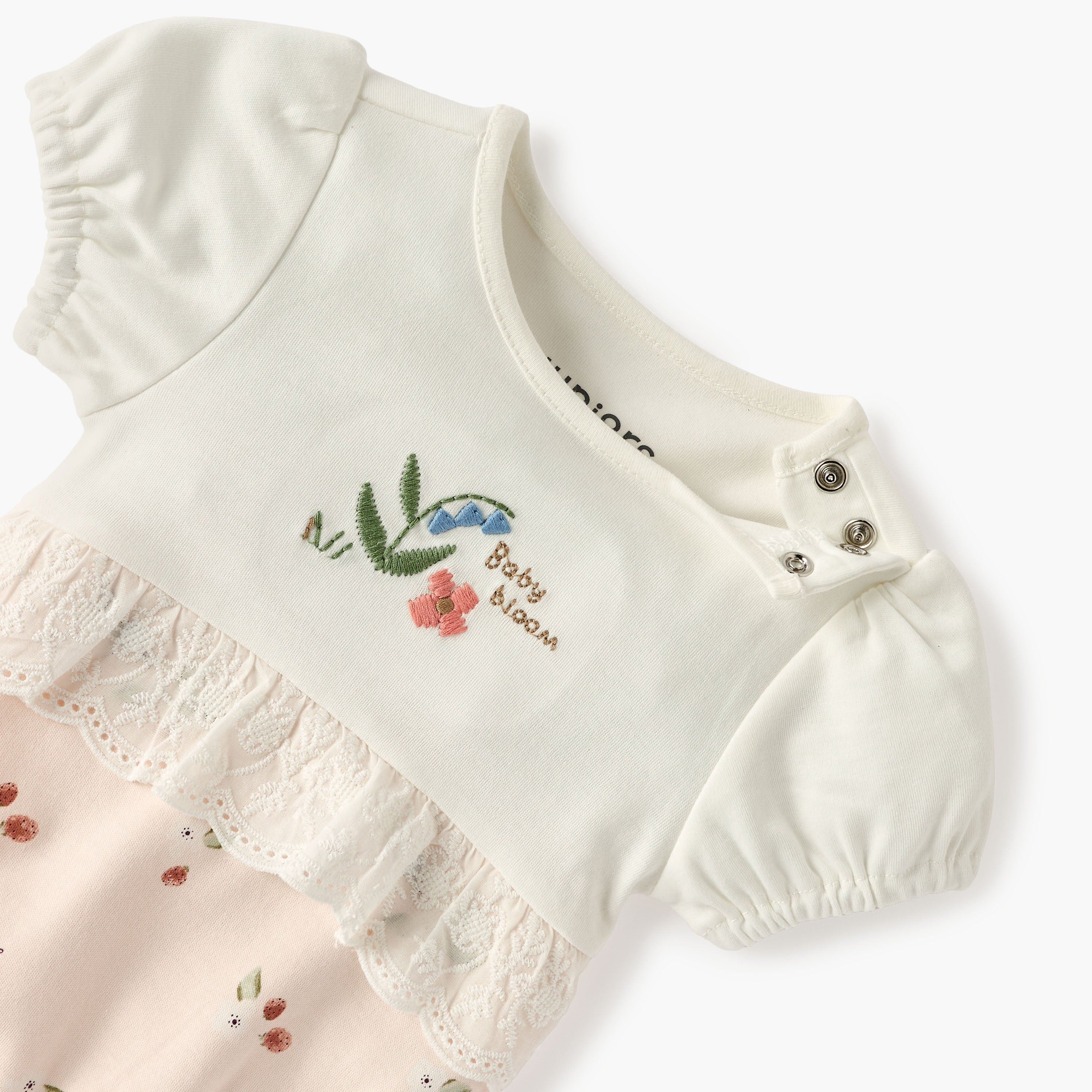 Juniors Embroidered Romper with Puff Sleeves and Lace Detail