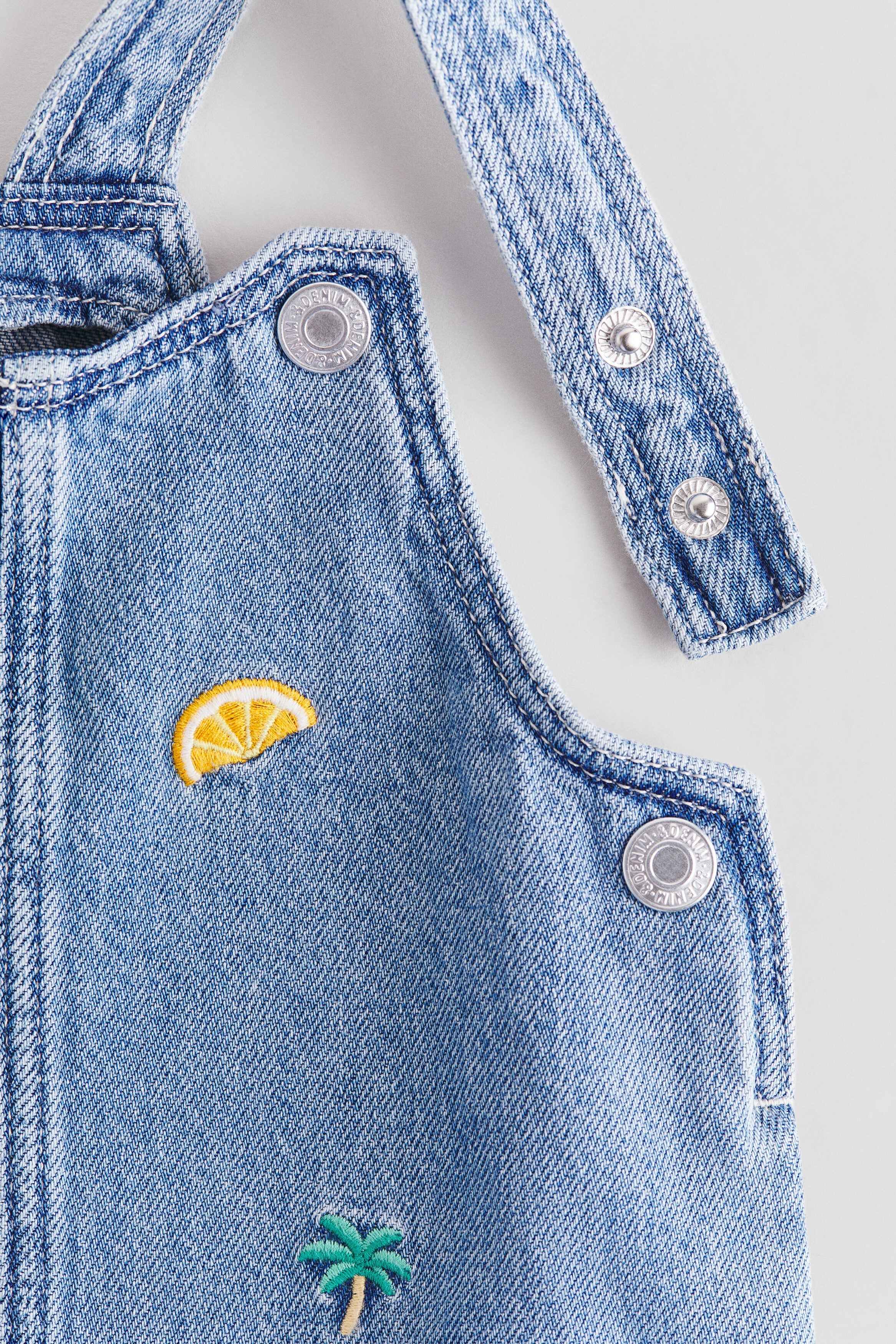 Embroidery-detail denim dungaree dress