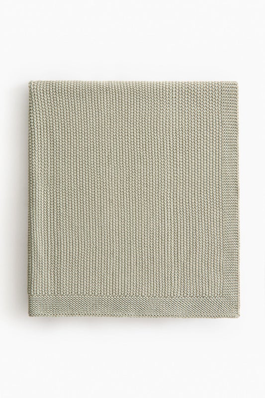 Moss-stitched cotton blanket