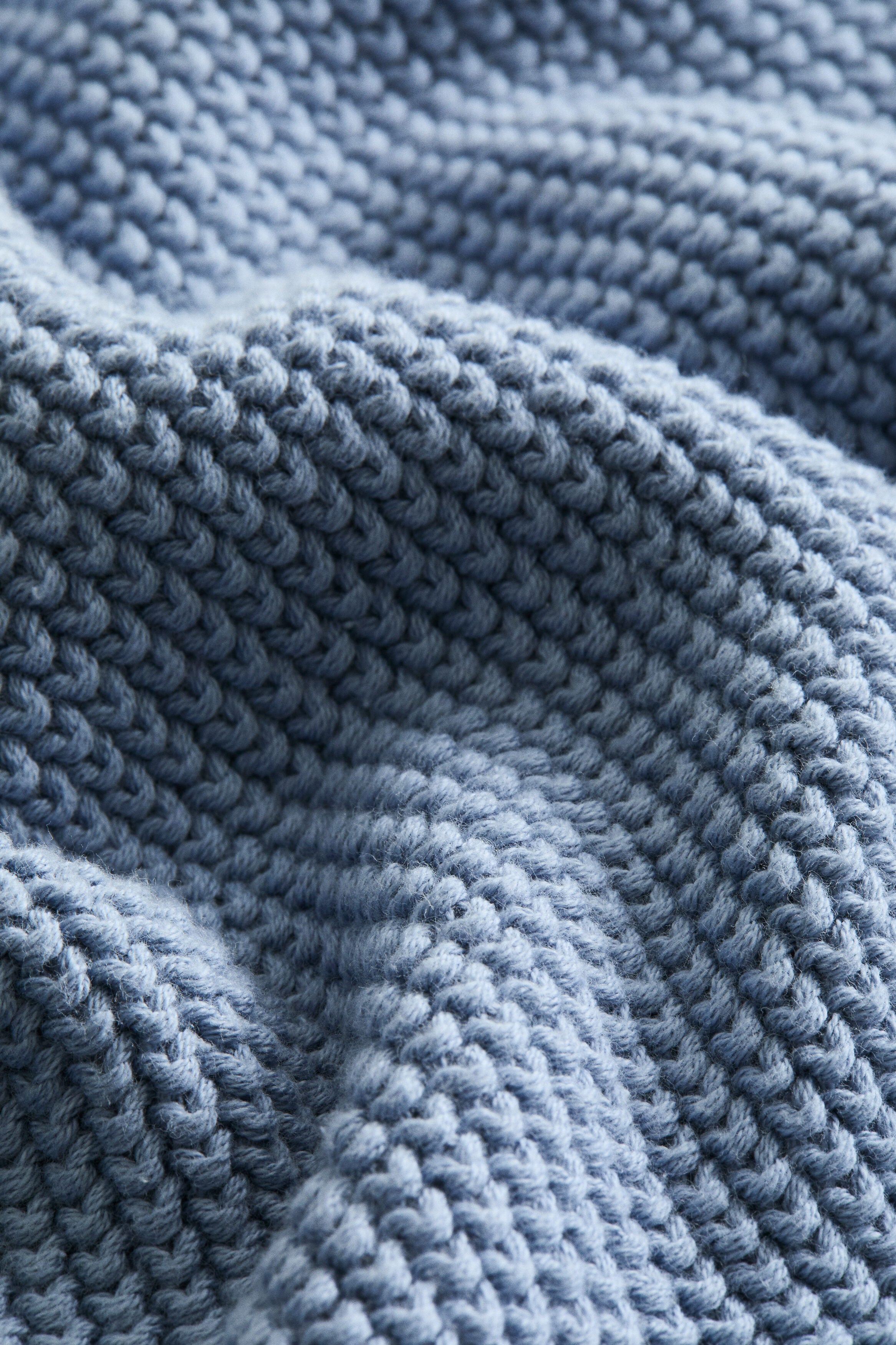Moss-stitched cotton blanket