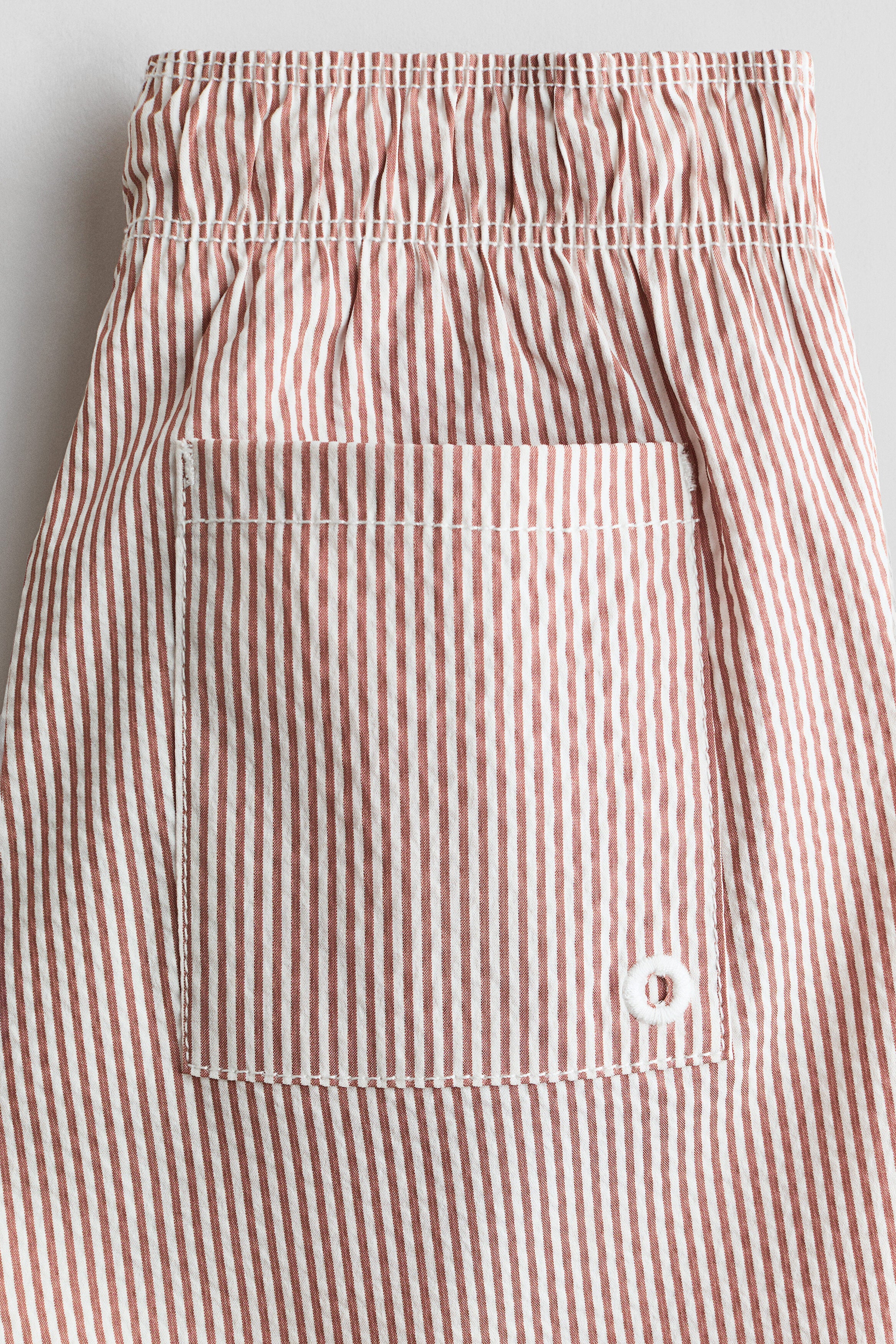 Patterned swim shorts