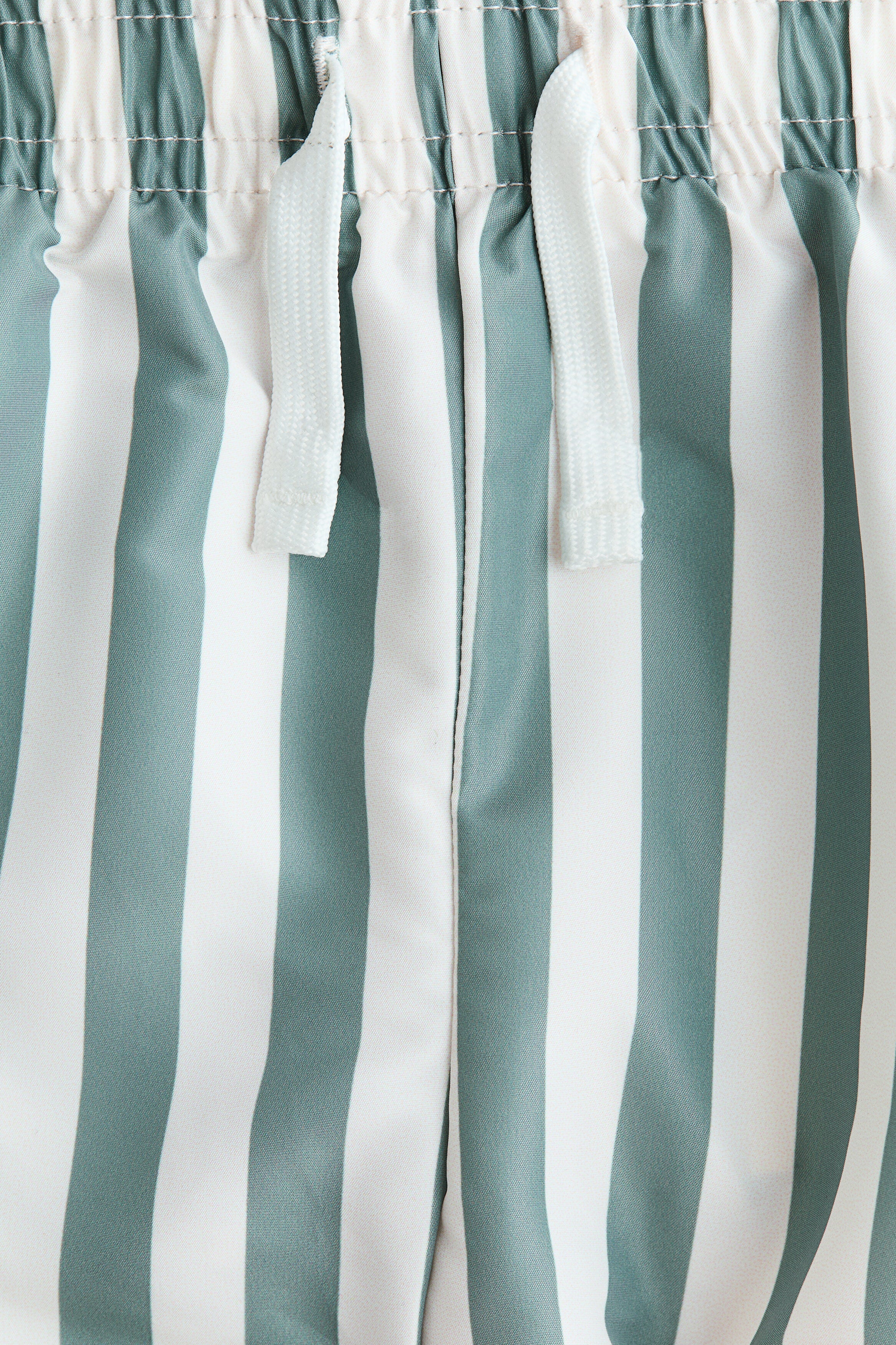 Patterned swim shorts