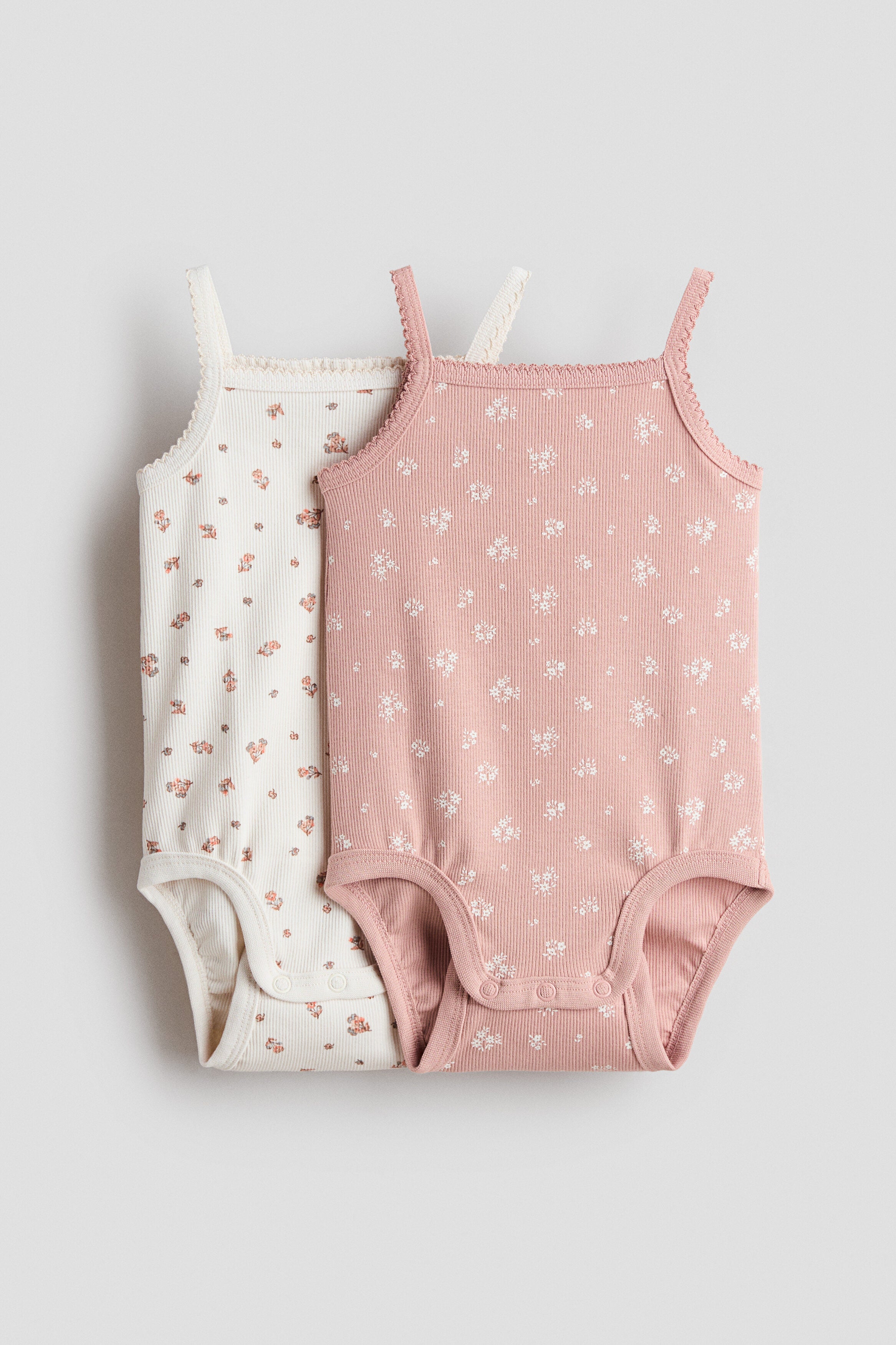 2-pack ribbed cotton bodysuits - 12M