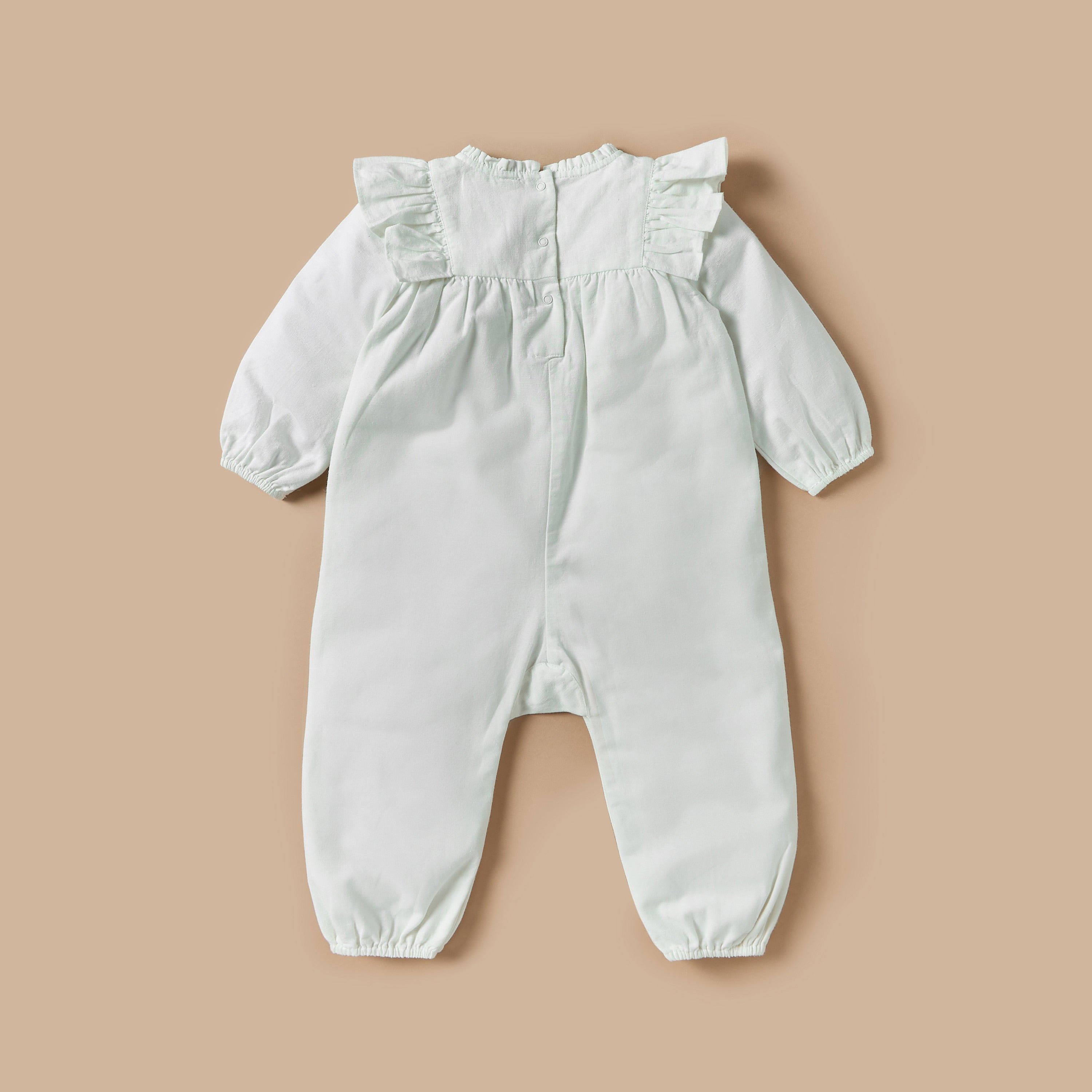 Giggles Textured Romper with Long Sleeves and Ruffle Detail