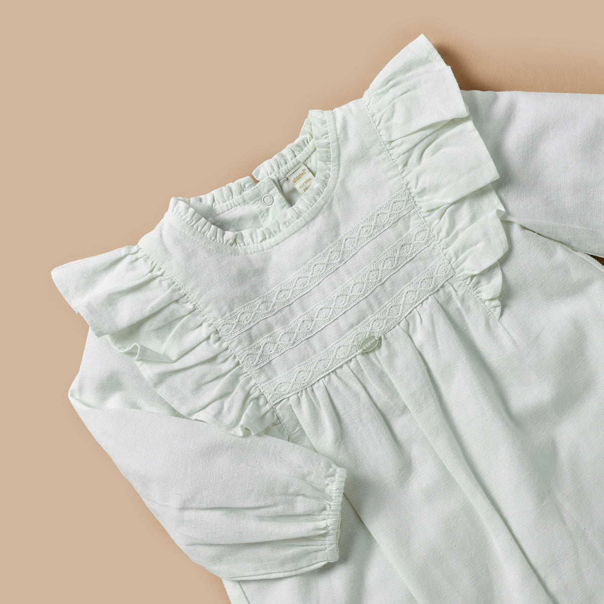 Giggles Textured Romper with Long Sleeves and Ruffle Detail