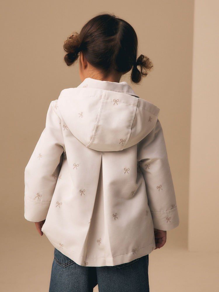 Neutral Bow Embroidered Shower Resistant Coat (3mths-7yrs)
