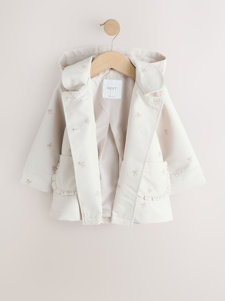 Neutral Bow Embroidered Shower Resistant Coat (3mths-7yrs)