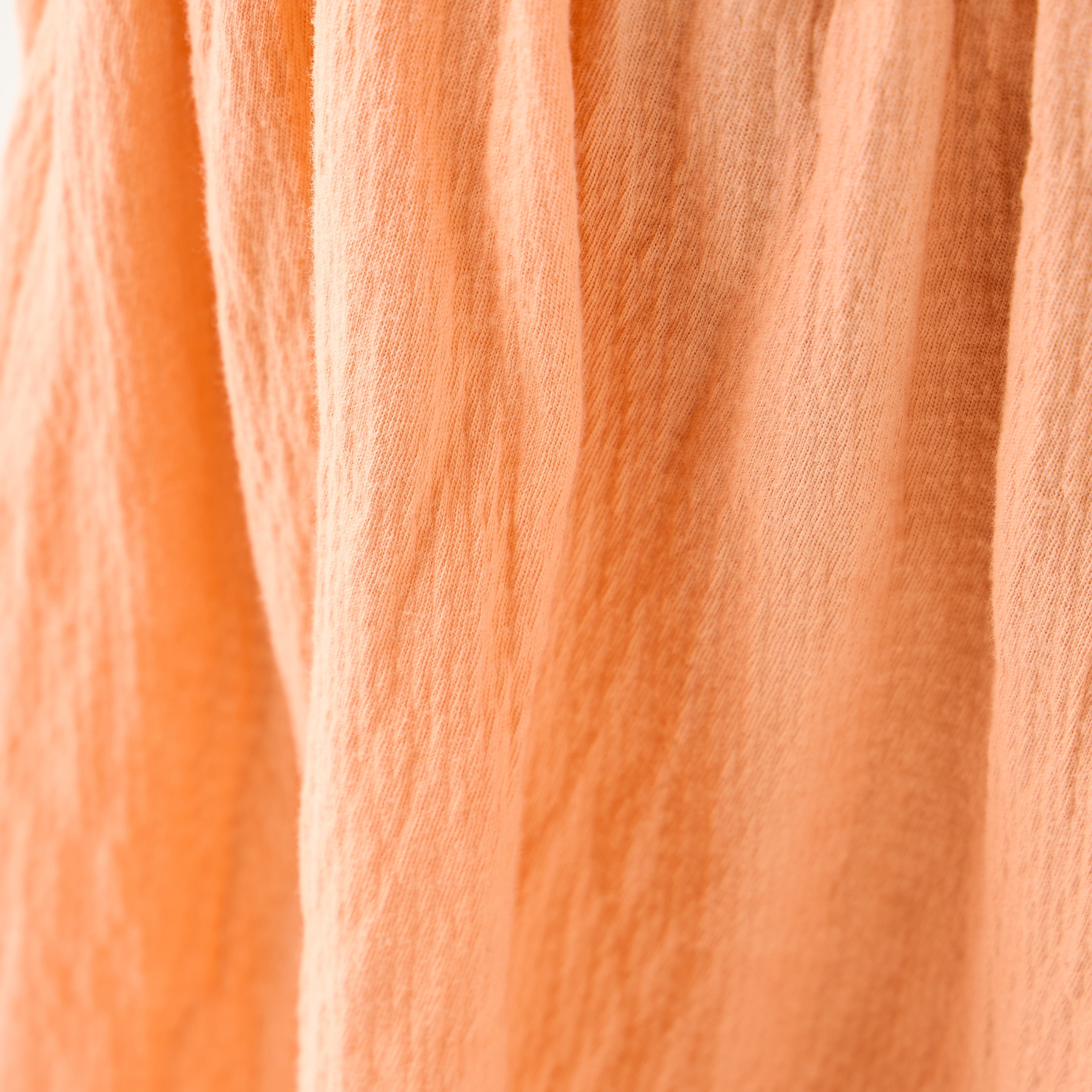 Juniors Textured Sleeveless Dress with Ruffle Trim and Bow Detail