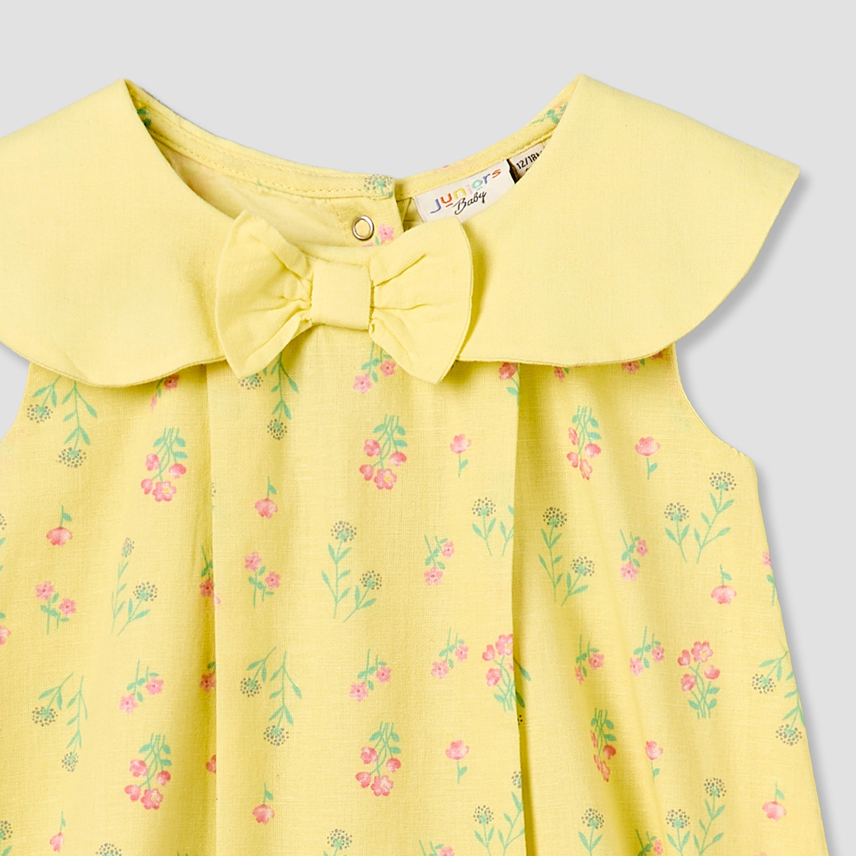 Juniors Peter Pan Collar Sleeveless Romper with Floral Print