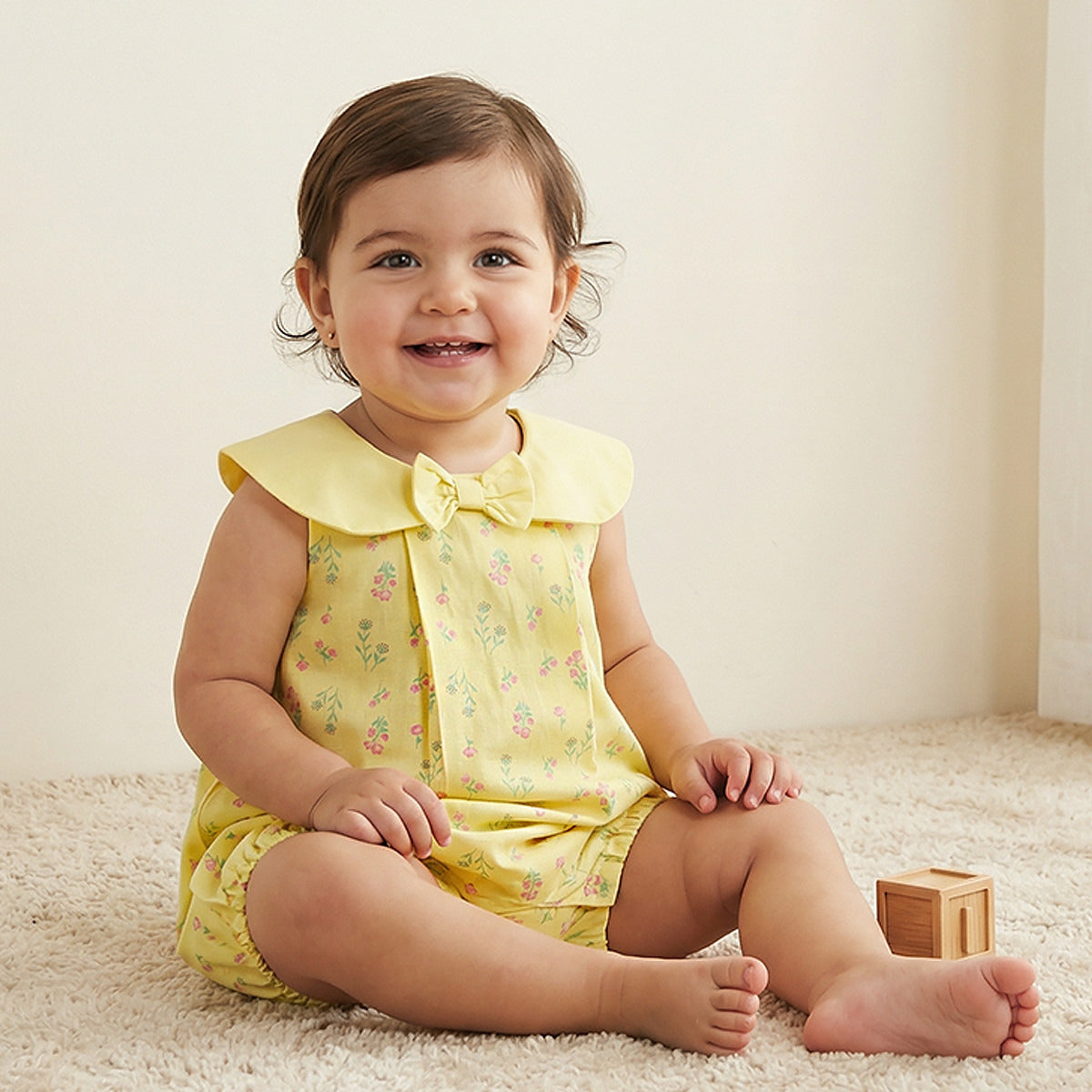 Juniors Peter Pan Collar Sleeveless Romper with Floral Print
