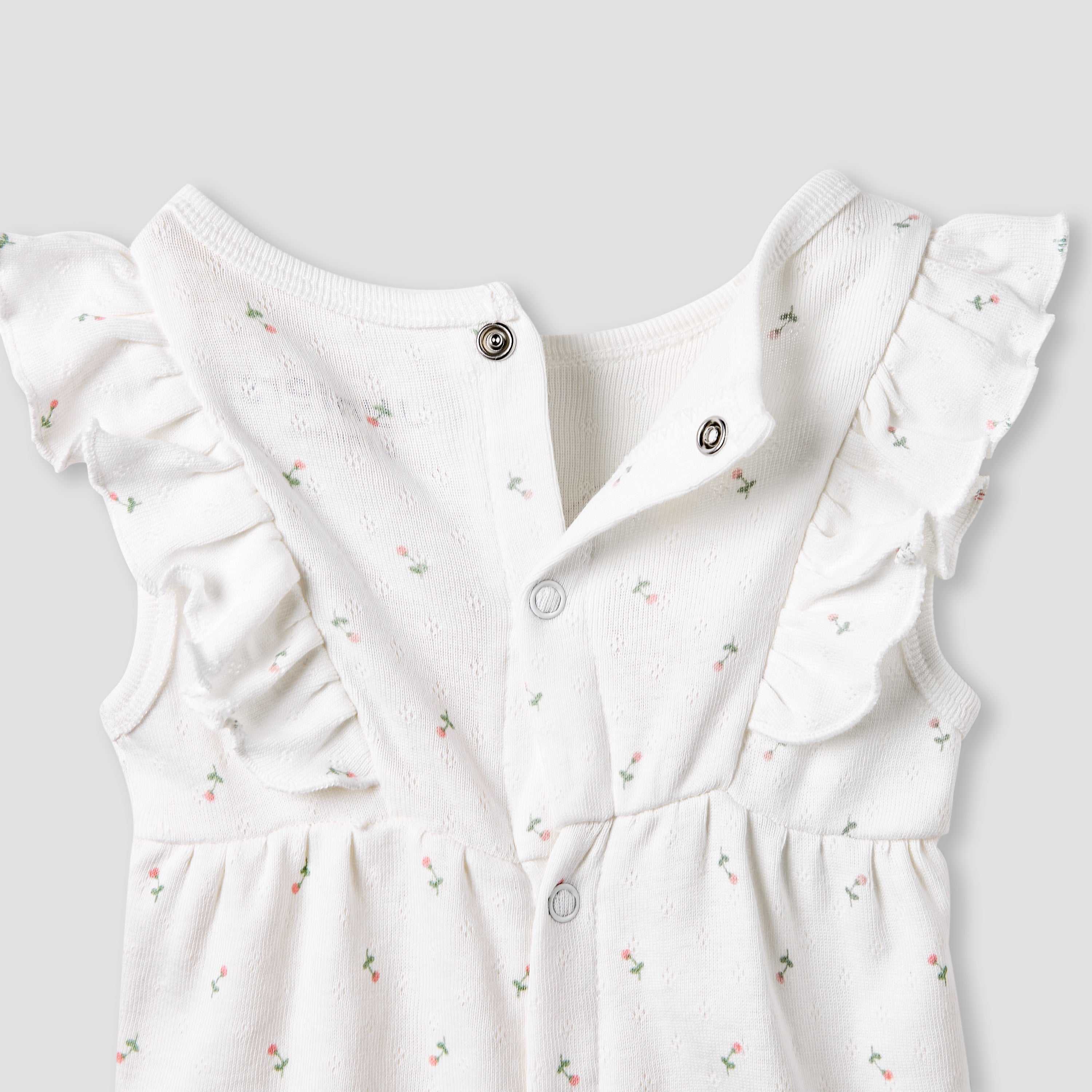 Juniors Printed Sleeveless Romper with Ruffle Accent