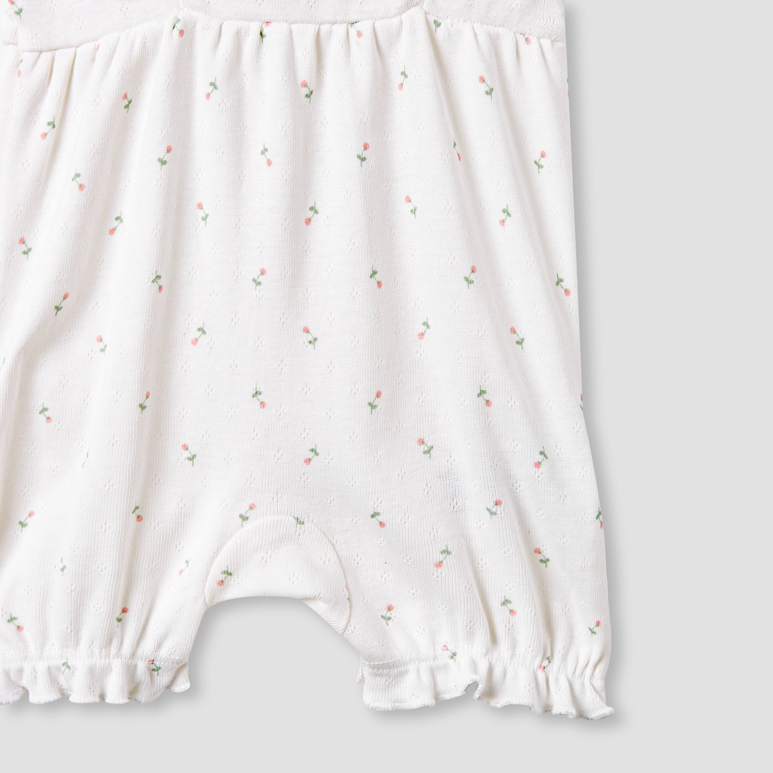 Juniors Printed Sleeveless Romper with Ruffle Accent