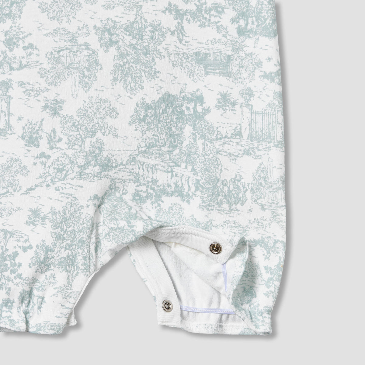 Giggles Crew Neck Sleeveless Romper with Floral Embroidery