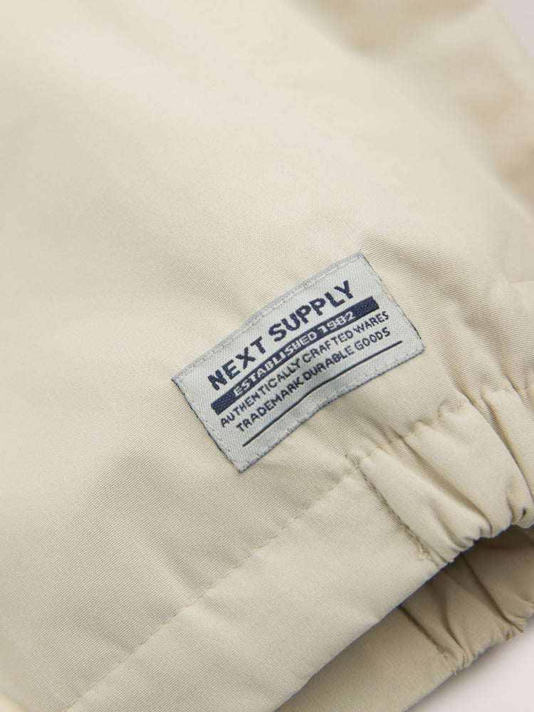 Buttermilk Waterproof Cagoule Jacket (3mths-7yrs)