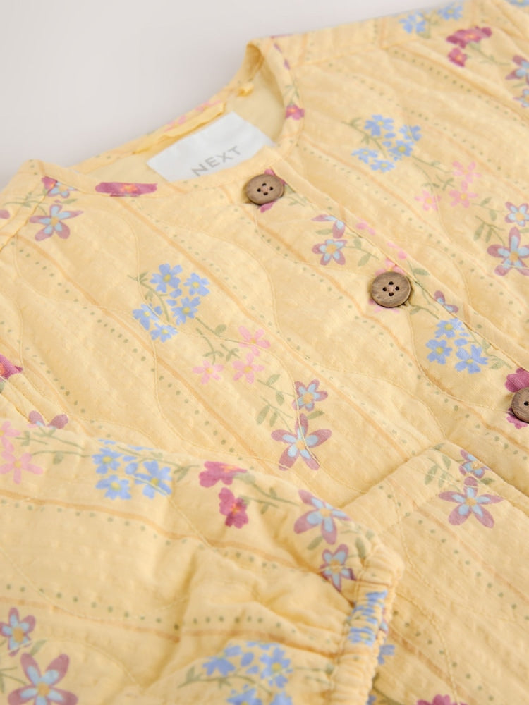 Yellow Flowers Printed Quilted Jacket (3mths-7yrs)
