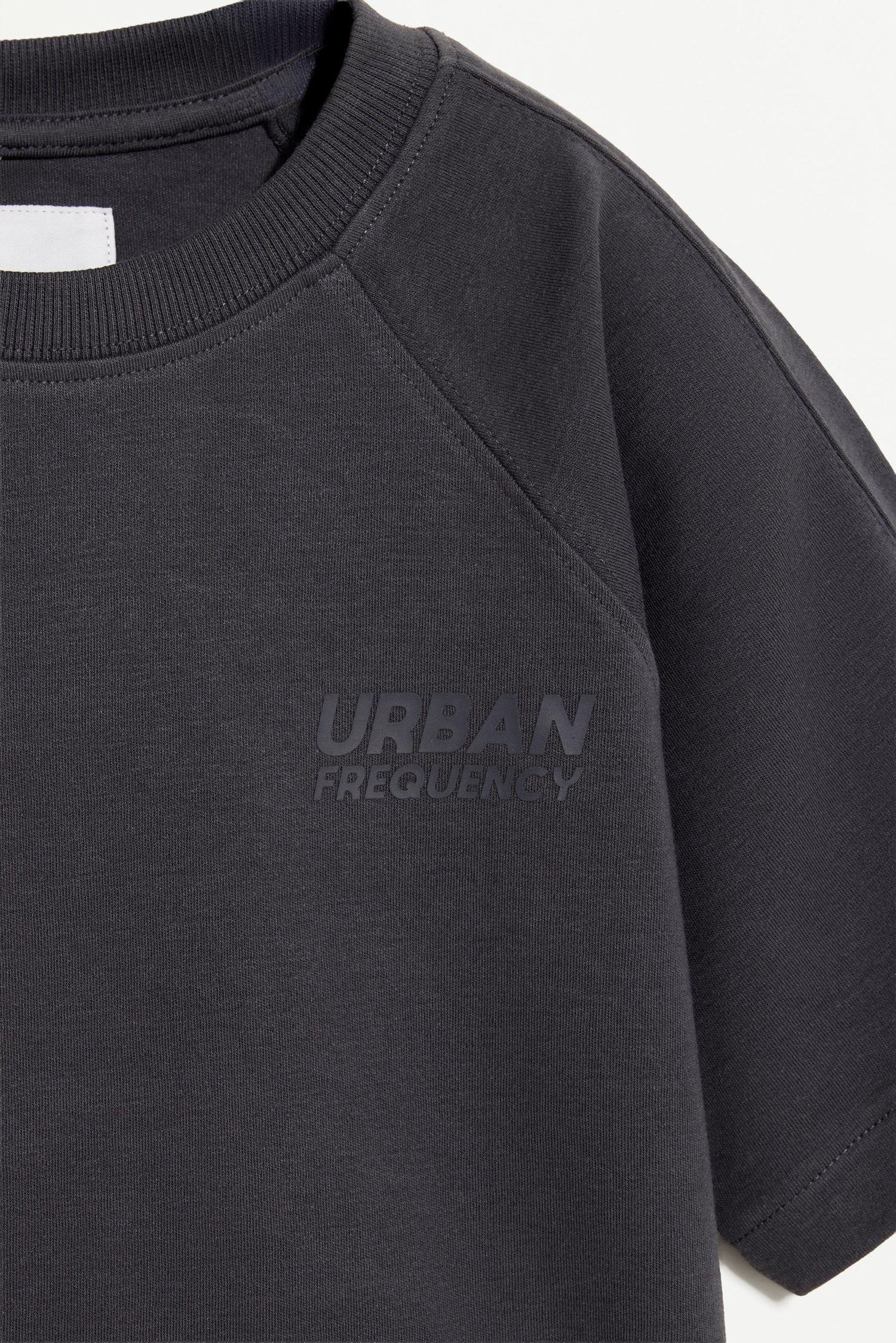 Interlock T-shirt with rubberised slogan