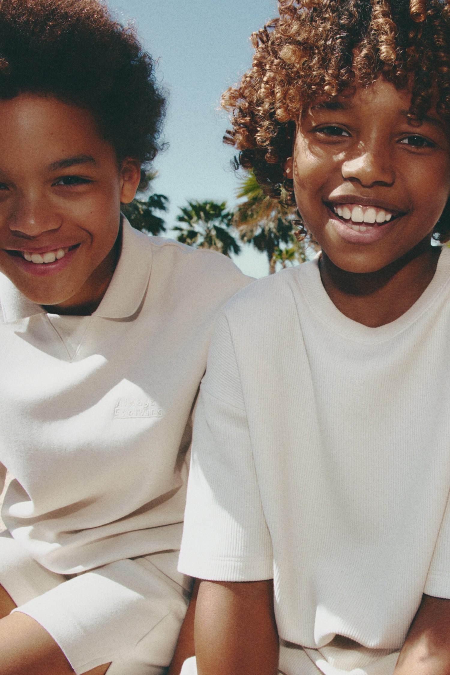 Interlock polo shirt with text - ECRU / 11-12 years