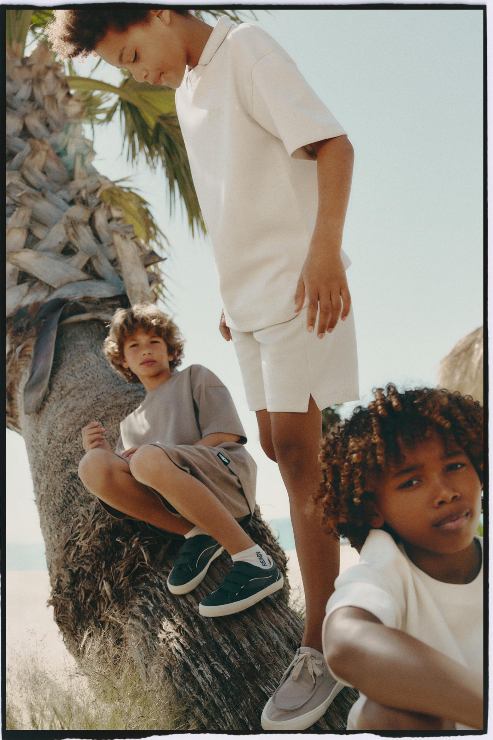 Interlock polo shirt with text