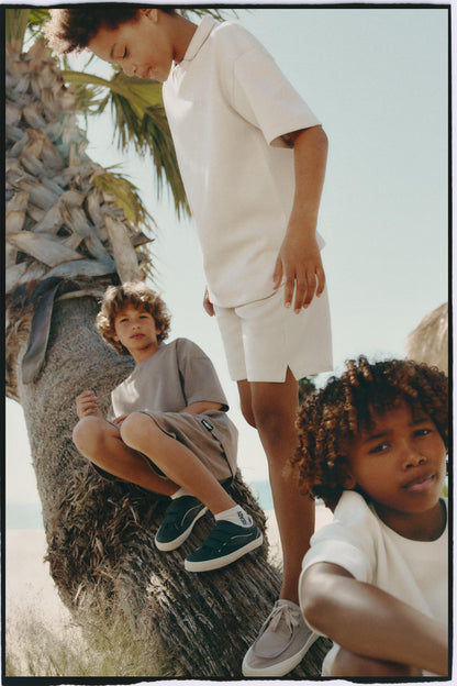 Interlock polo shirt with text