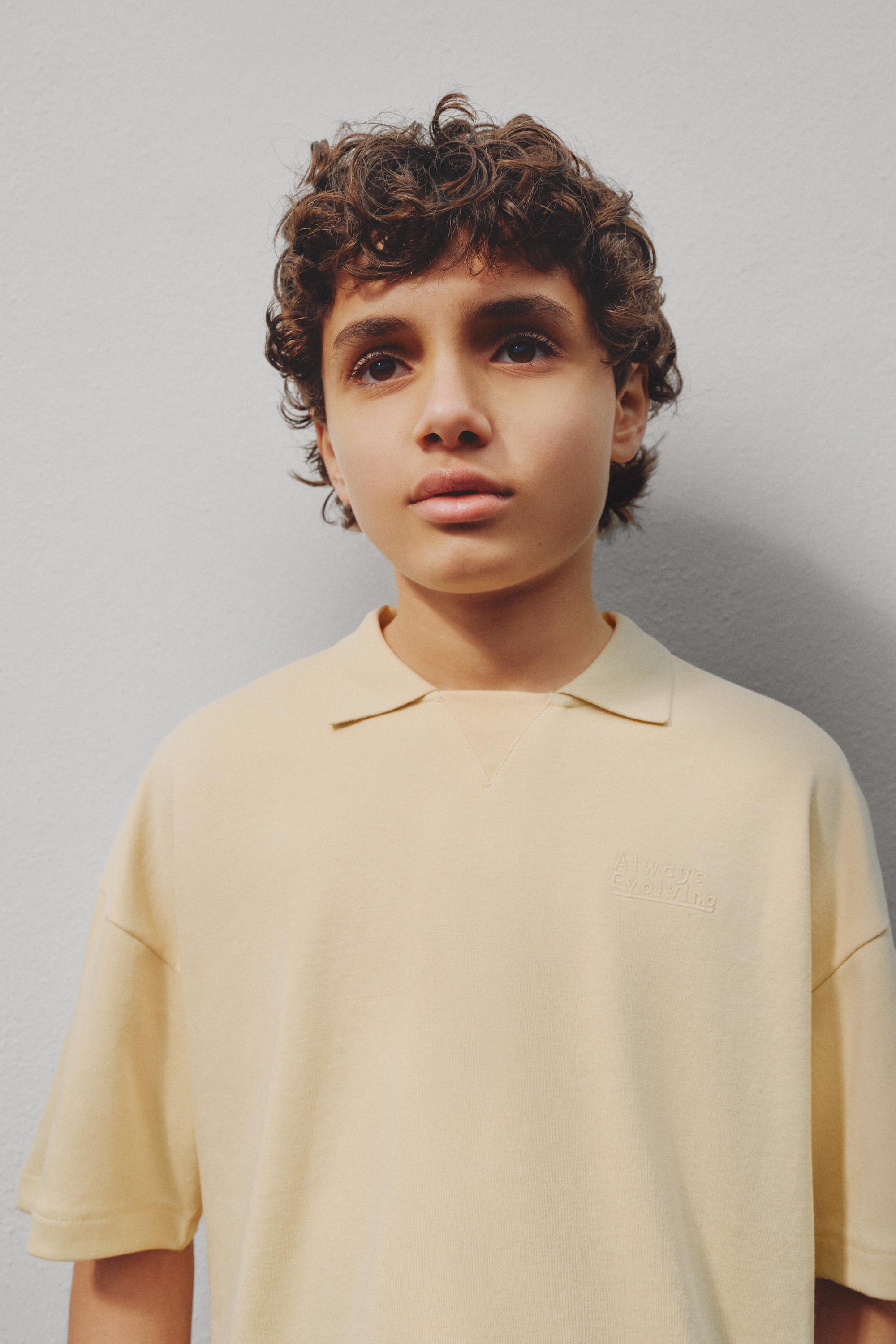 Interlock polo shirt with text - VANILLA / 11-12 years