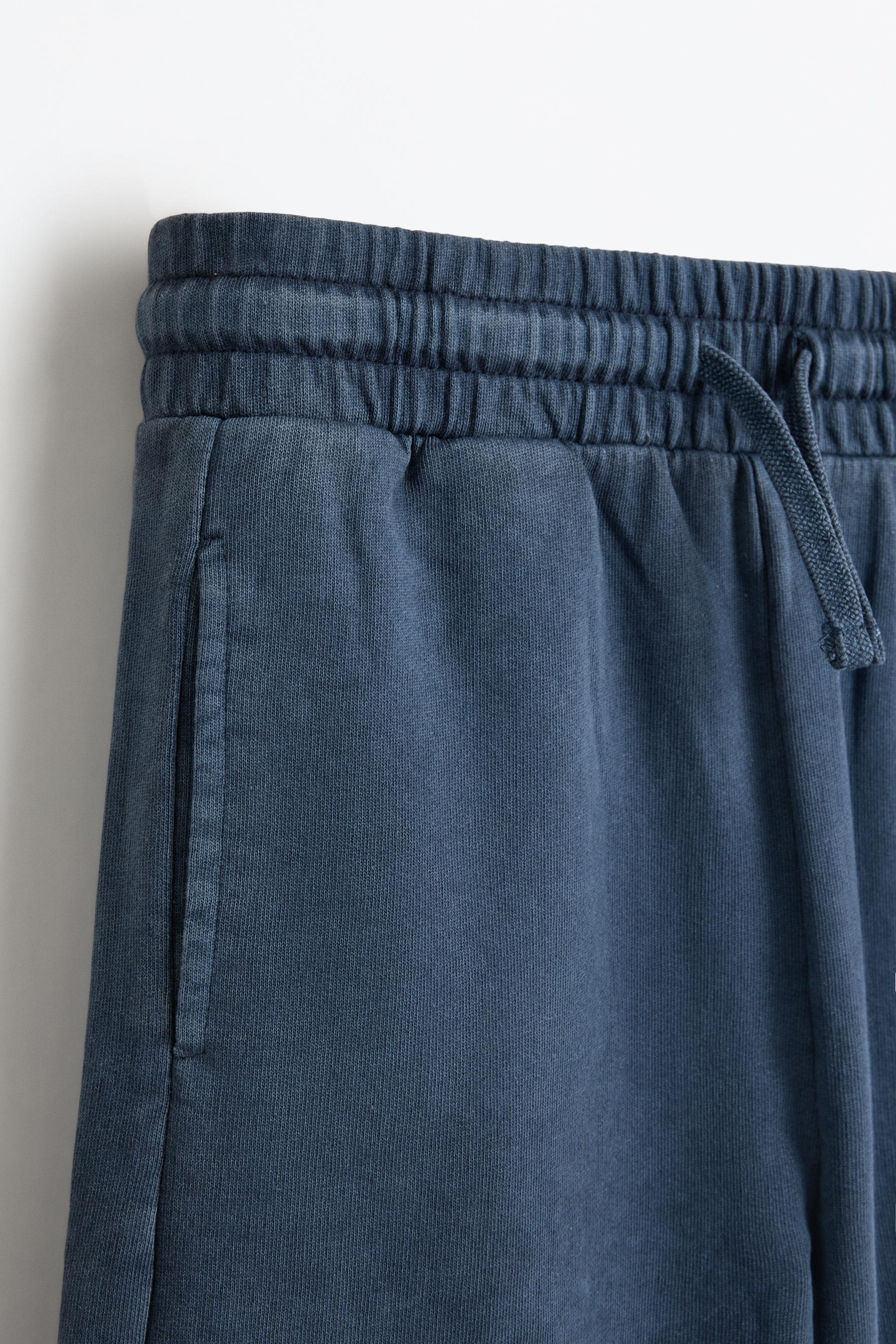 Bermuda shorts with text patches