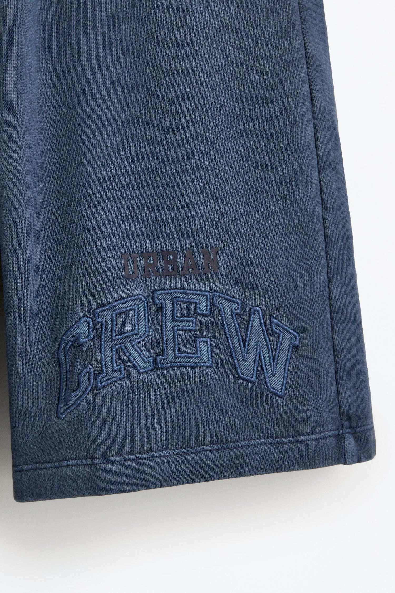 Bermuda shorts with text patches
