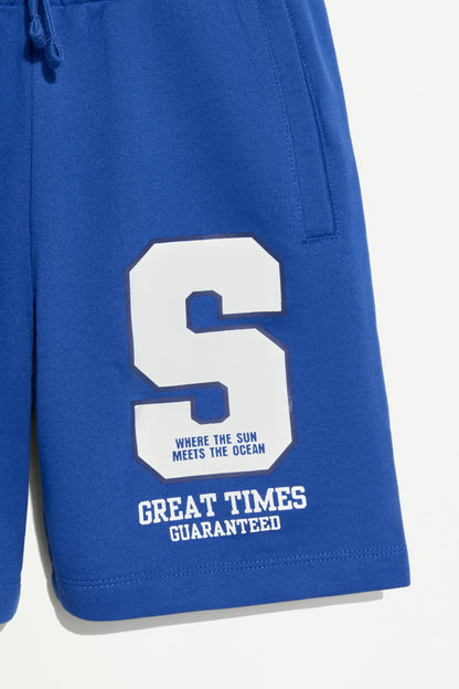 Plush Bermuda shorts with text