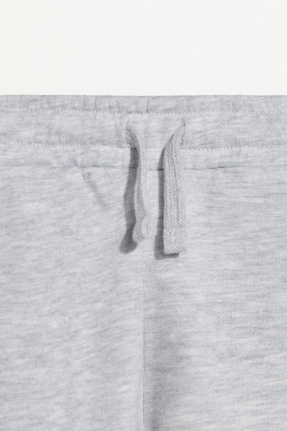 Plush Bermuda shorts with text