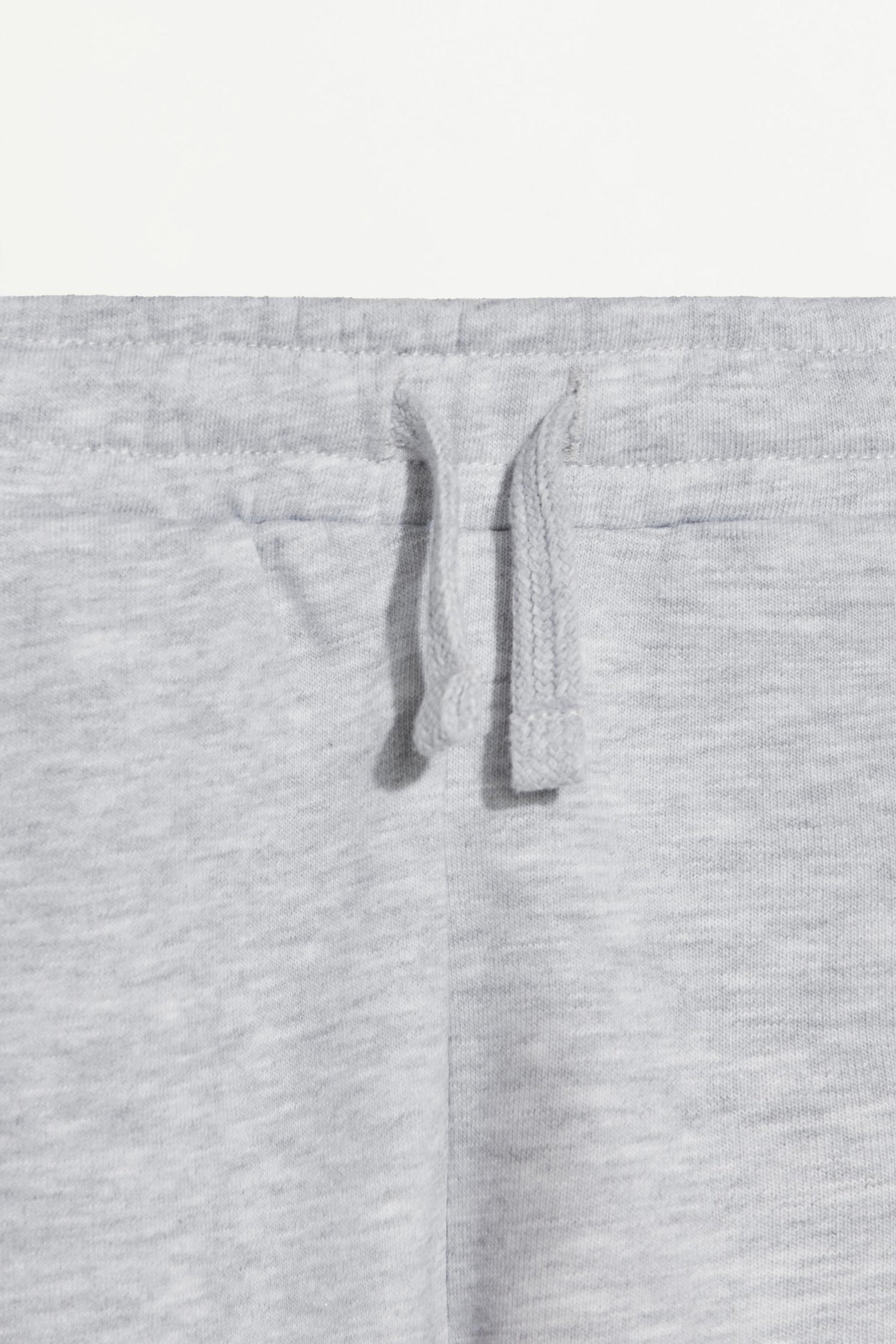 Plush Bermuda shorts with text