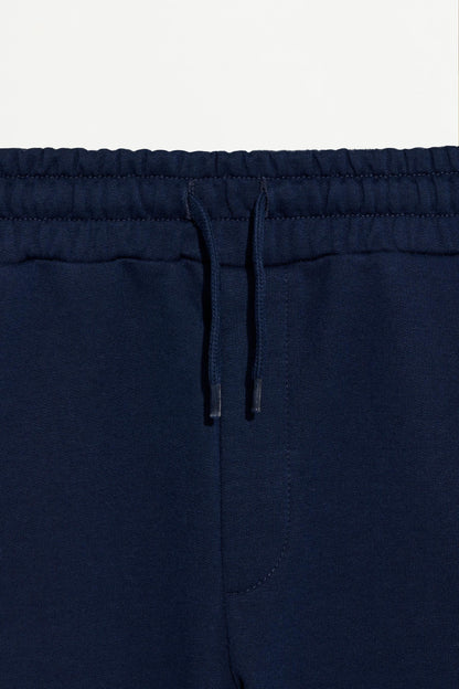 Plush Bermuda shorts with contrast stitching