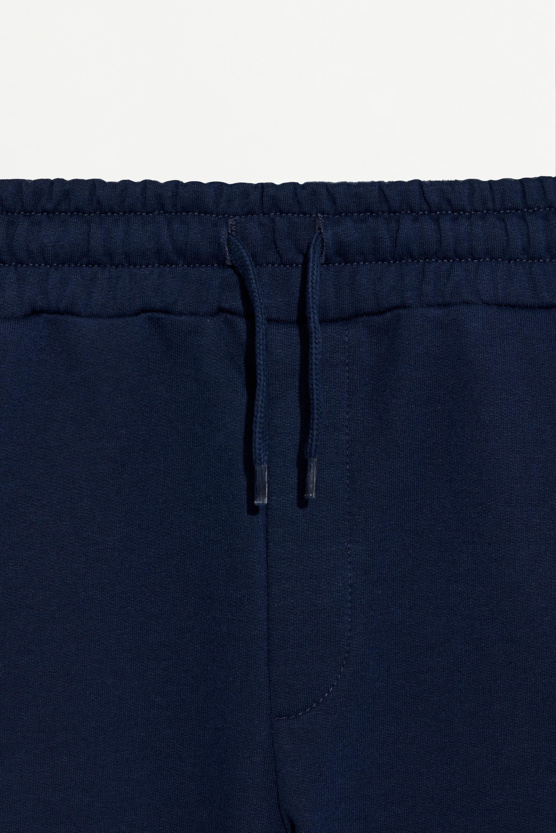 Plush Bermuda shorts with contrast stitching