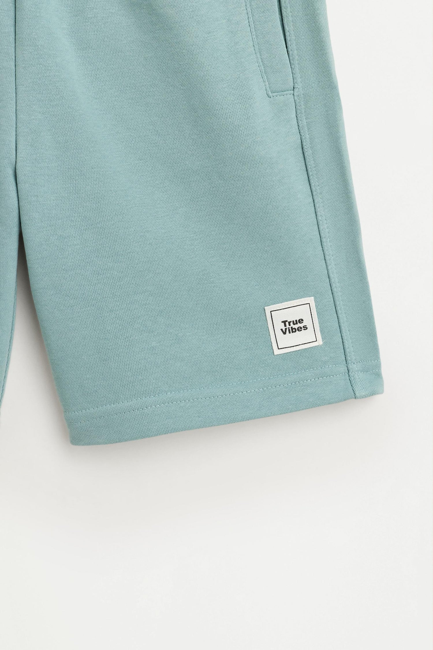 T-shirt and Bermuda shorts set