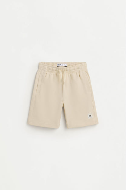 T-shirt and Bermuda shorts set
