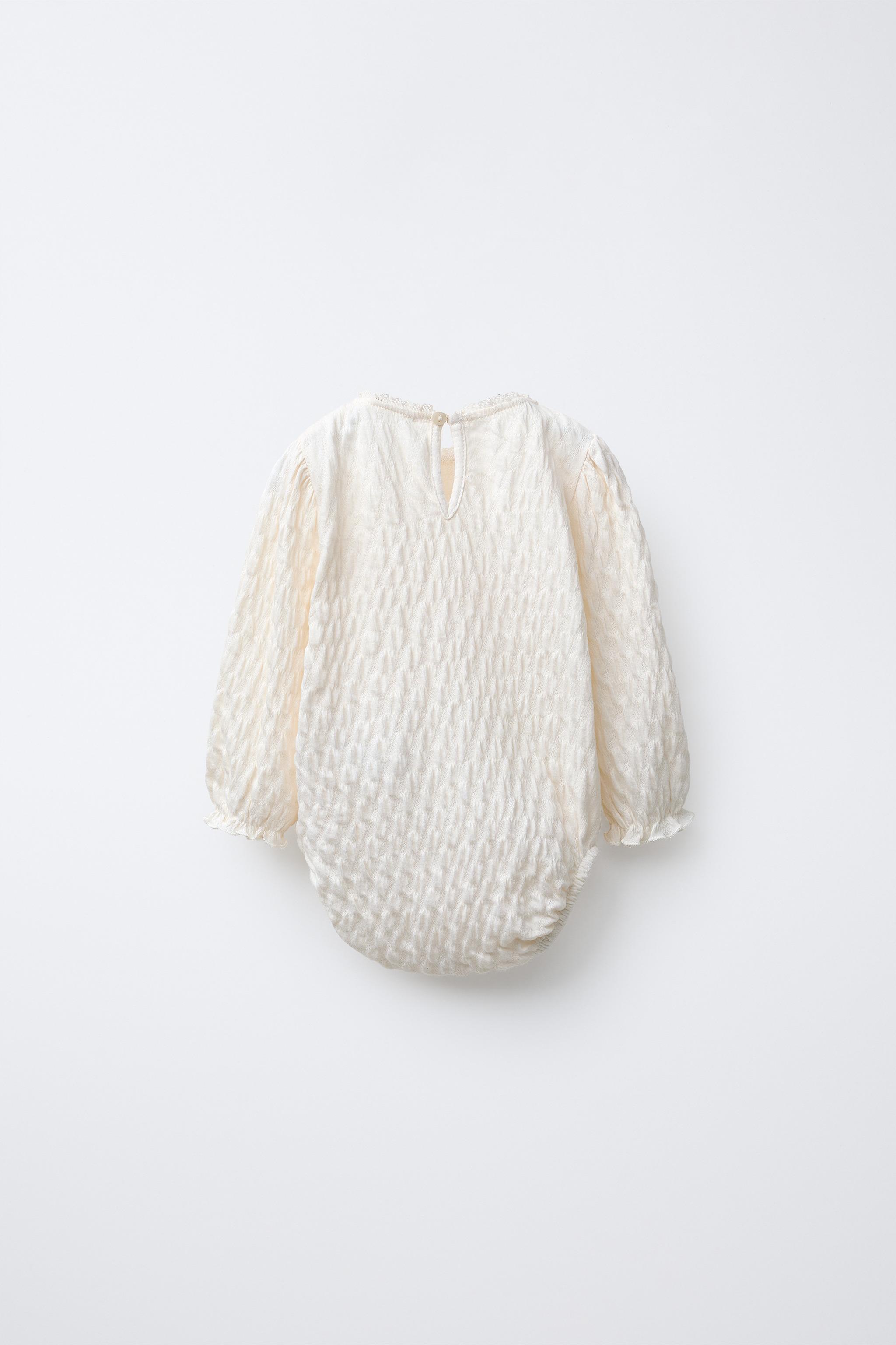 TEXTURED LACE BODYSUIT