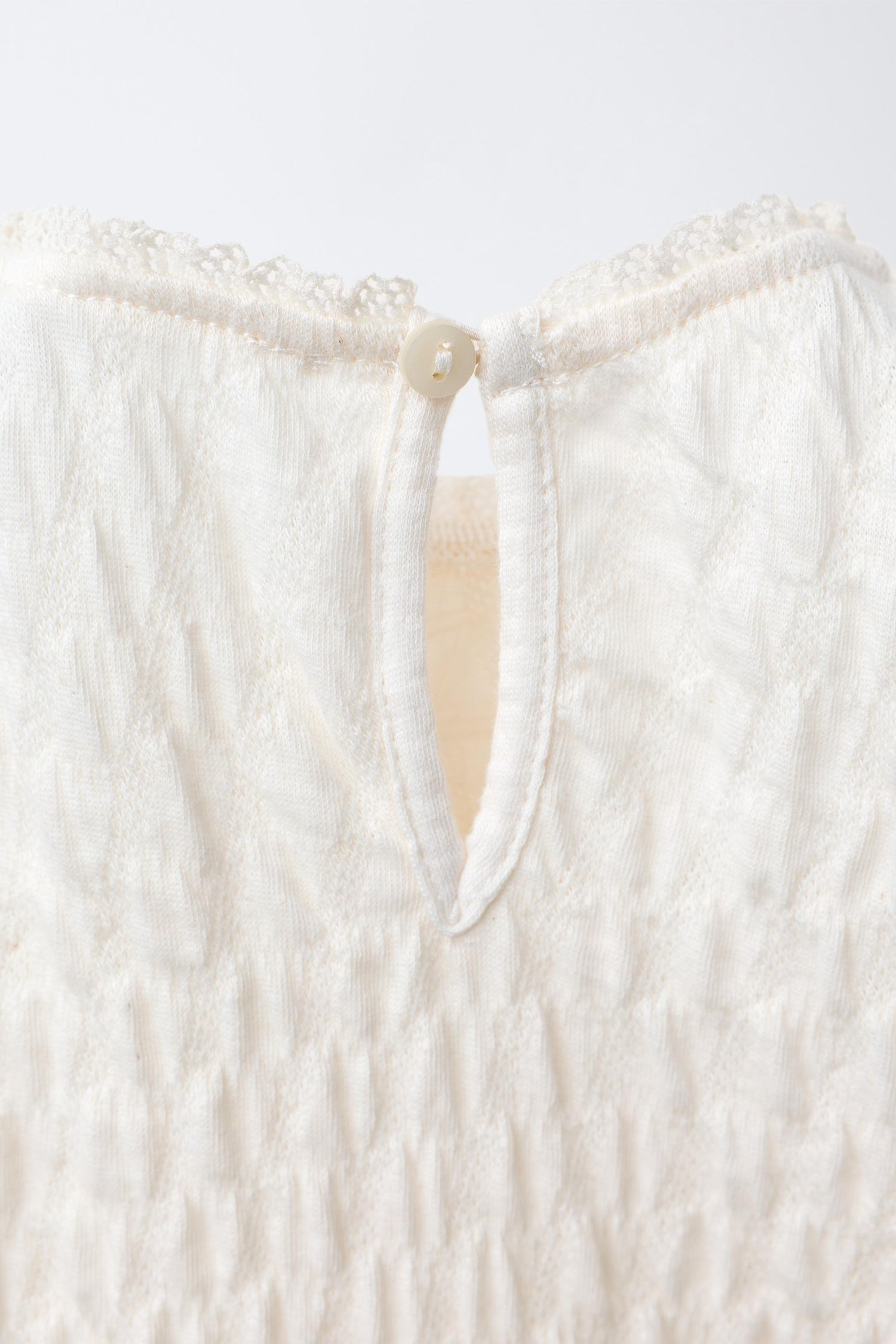 TEXTURED LACE BODYSUIT