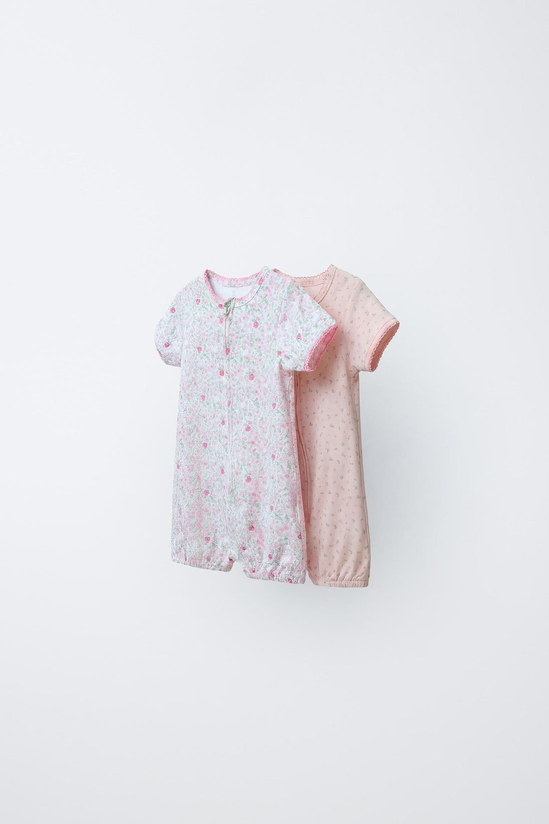 TWO-PACK OF FLORAL SLEEPSUITS - Pink / 12-18 months (86 cm)