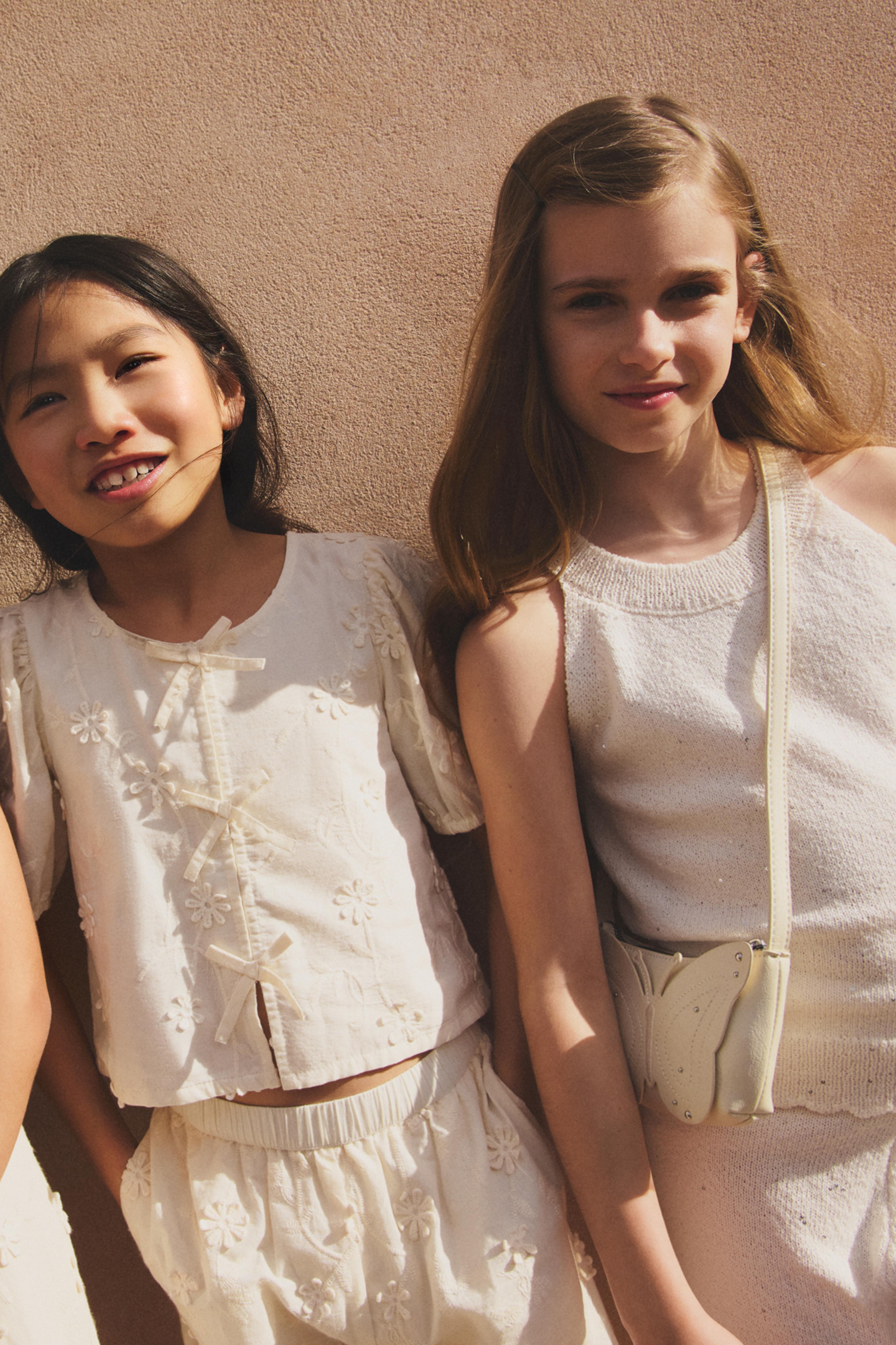 Embroidered relief blouse
